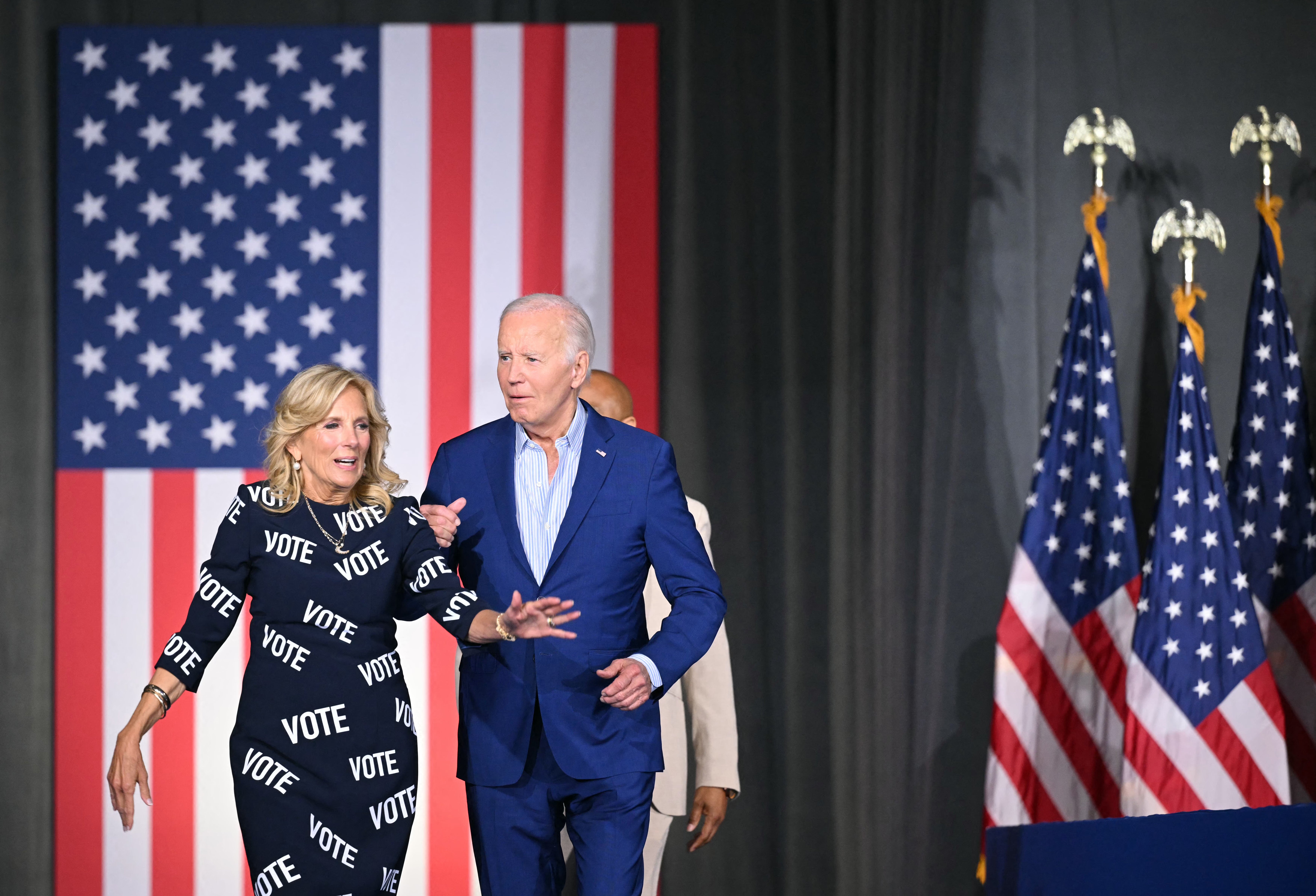 US President Joe Biden and First Lady Jill Biden arrive for a post-debate rally in Raleigh, North Carolina