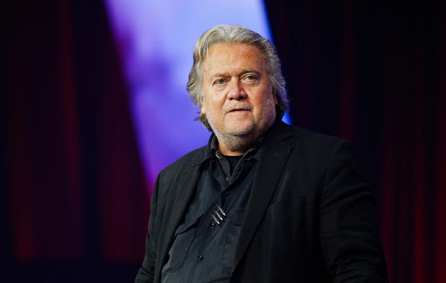 <p>Steve Bannon appears at the far-right Turning Point Action conference in Detroit on June 15. He must turn himself over to federal prison authorities on July 1 for contempt of Congress. </p>