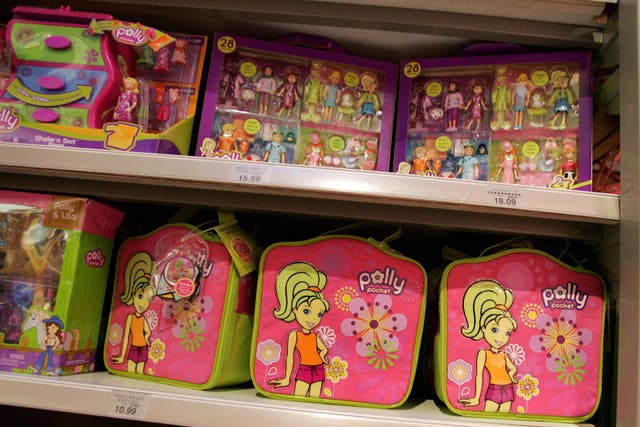 <p>Polly Pockets on display in New York in 2007. Their creator, Chris Wiggs, died last week at 74</p>