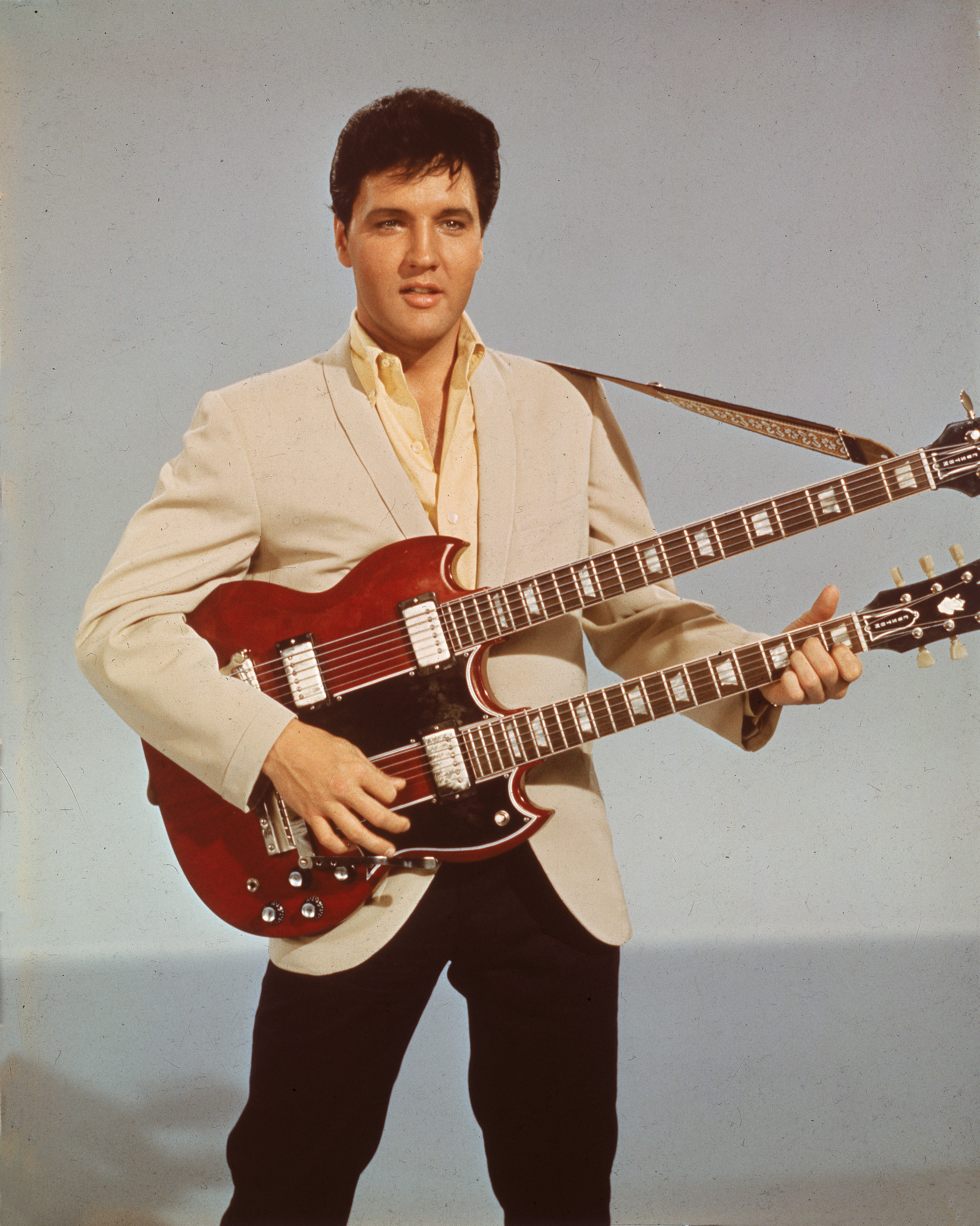 Elvis Presley pictured performing in 1966. Presley gave the blue suede shoes to his close friend after an all-night party at his Graceland mansion