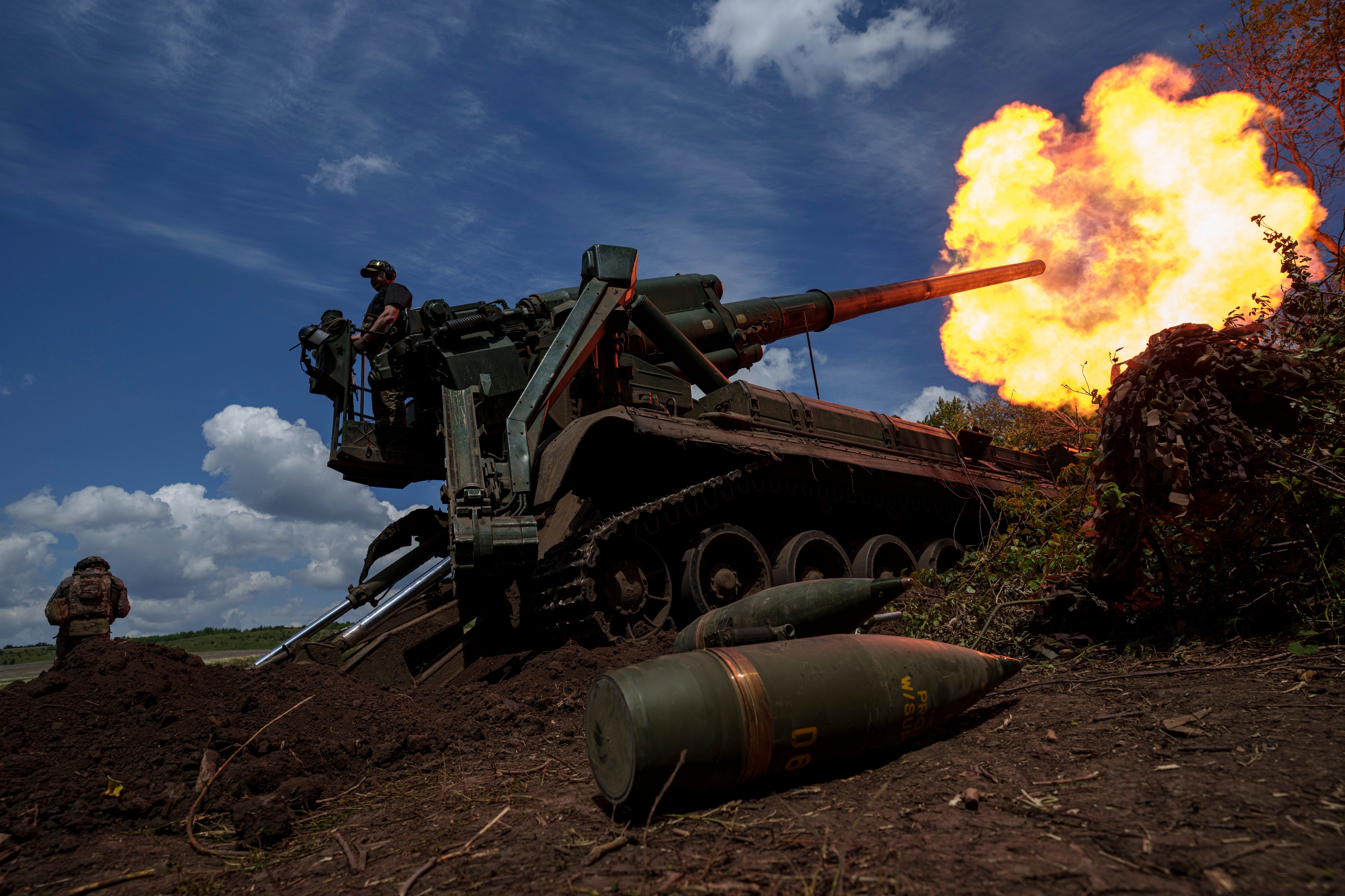 Ukrainian soldiers fire on Russian positions along the front line in the Donetsk region of Ukraine