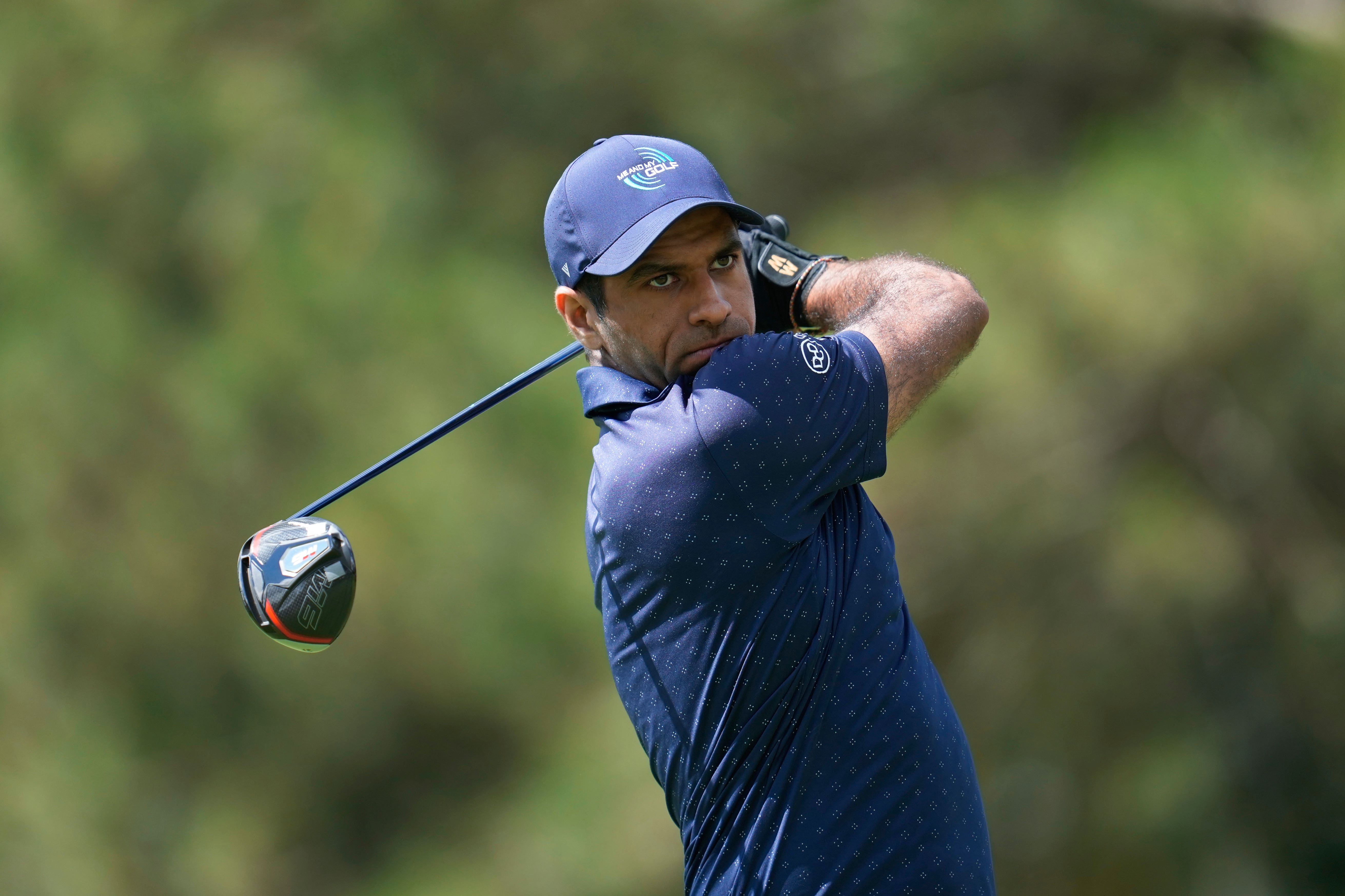 Aaron Rai hits off the fourth tee during the first round of the Rocket Mortgage Classic (Paul Sancya/AP)