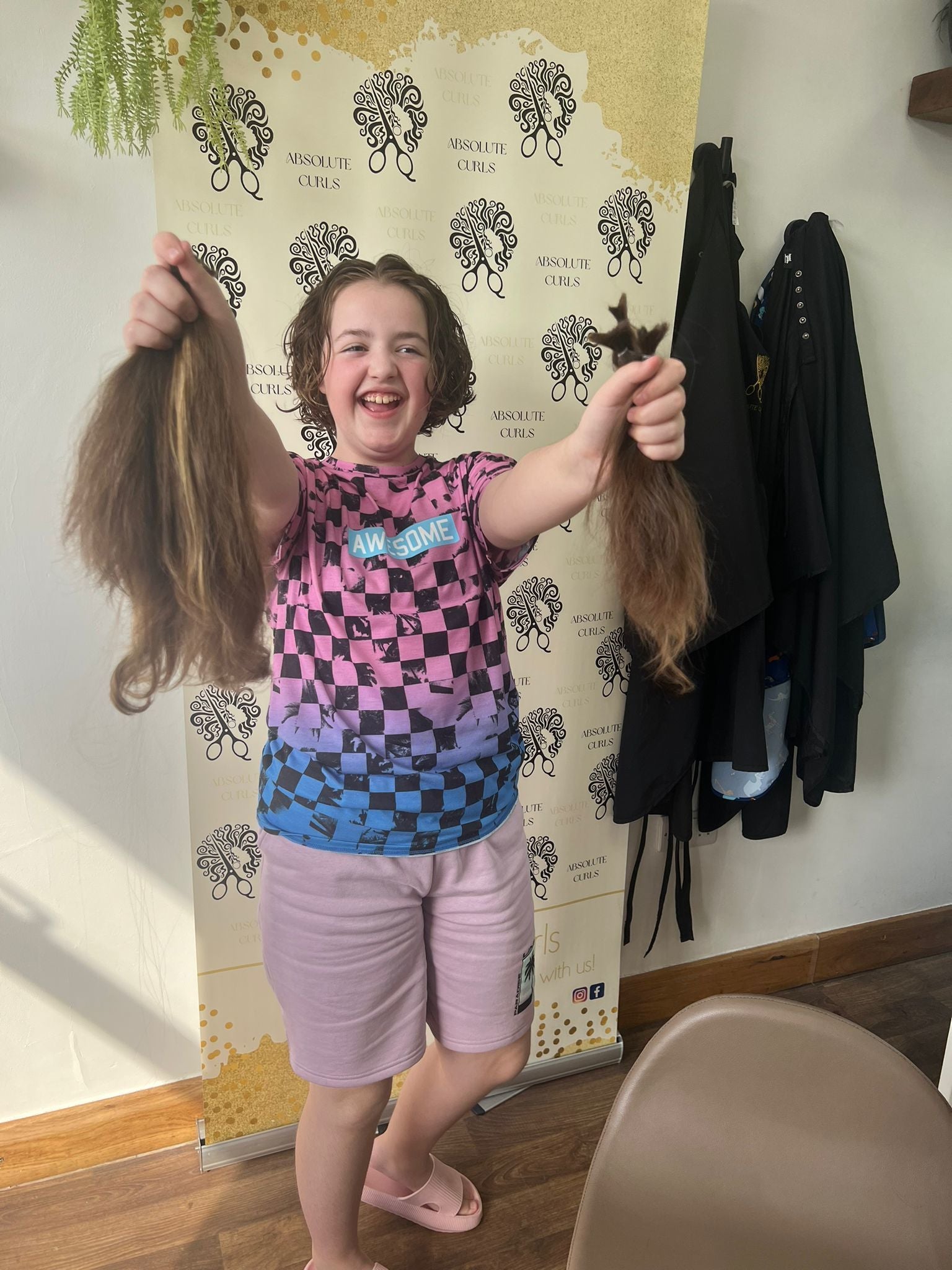 Lexie Warwick-Oliver after she had her hair cut (Jess Warwick-Oliver/PA)