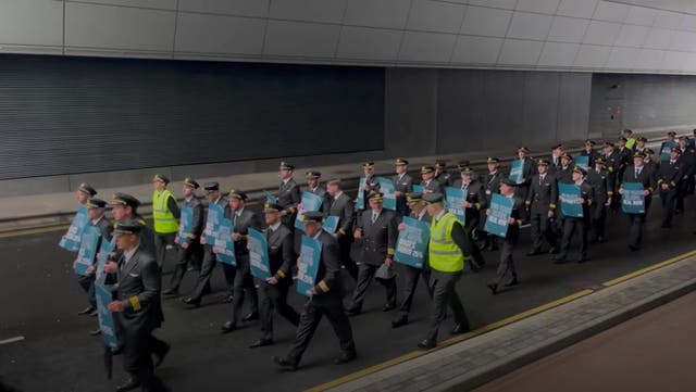 <p>Hundreds of Aer Lingus pilots march around Dublin Airport as eight-hour strike gets underway.</p>