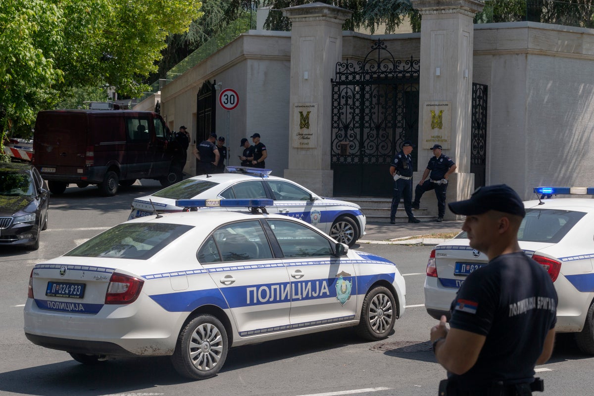 An attacker wounds a police officer guarding Israel’s embassy in Serbia before being shot dead