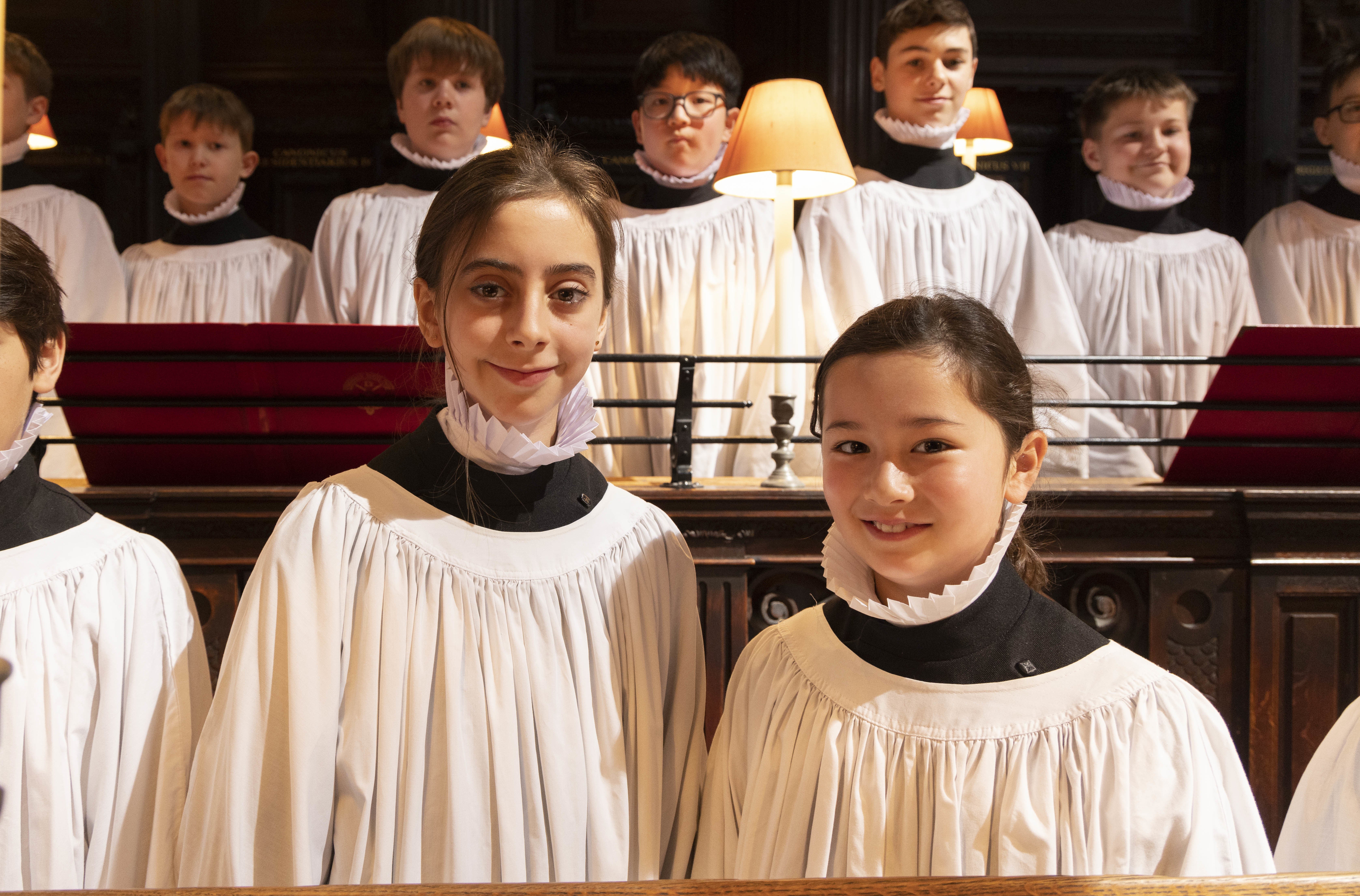 Choristers Lila, 11 and Lois (right), 10, at St Paul’s Cathedral in London (Tim Anderson/PA)