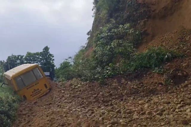 <p>School bus full of pupils buried by landslide in India.</p>