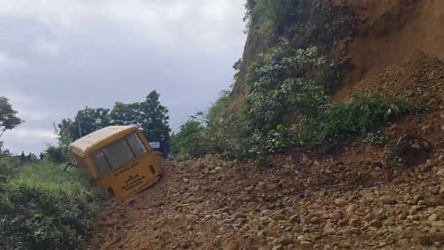 <p>School bus full of pupils buried by landslide in India.</p>