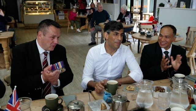 <p>Rishi Sunak greeted by laughter from veterans during Armed Forces visit.</p>