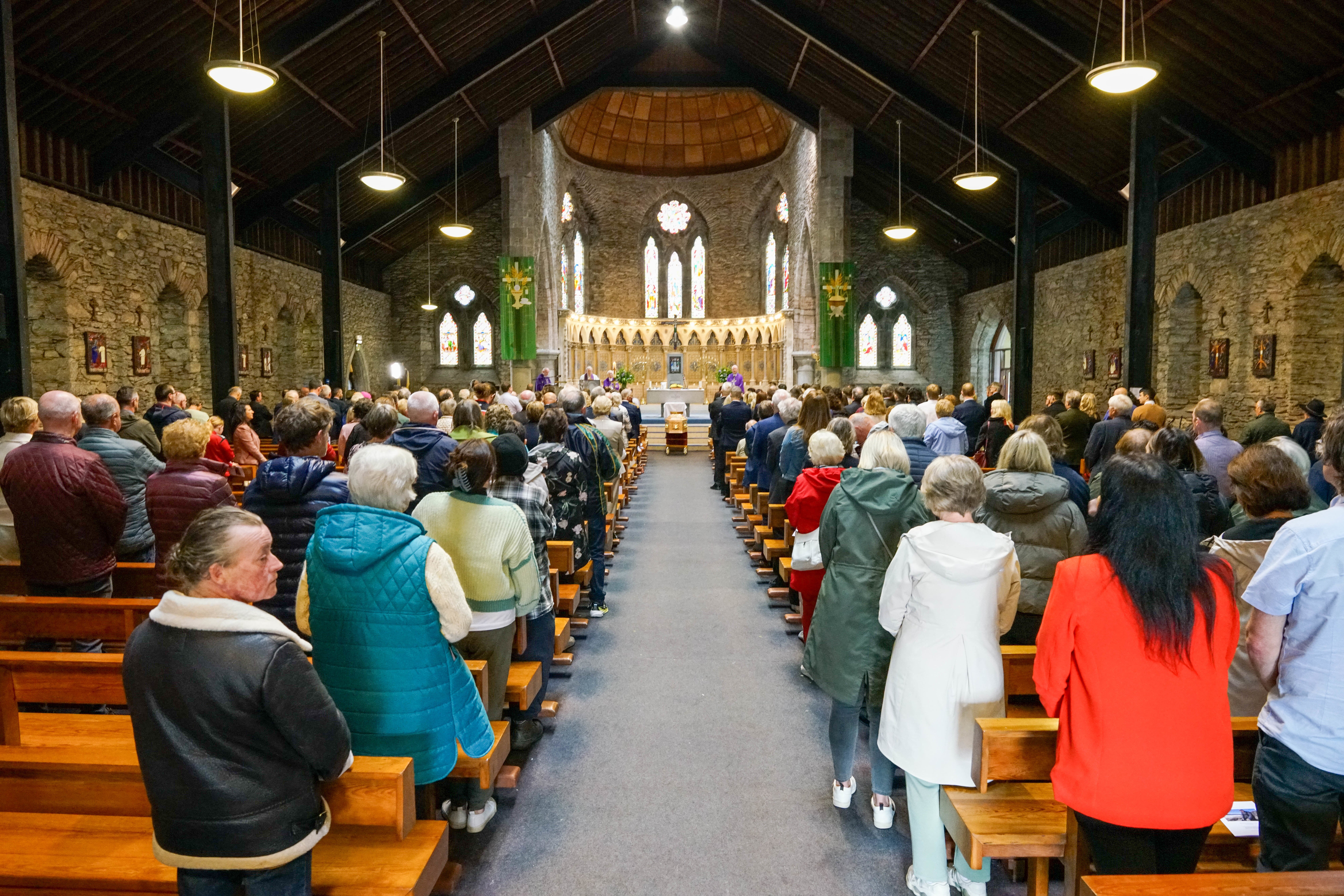 The congregation during the funeral for renowned Gaelic games commentator Micheal O Muircheartaigh at St Mary’s Church in Dingle, Co Kerry (Noel Sweeney/PA)