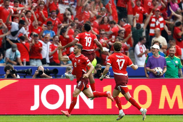 <p>Ruben Vargas celebrates putting Switzerland in front</p>