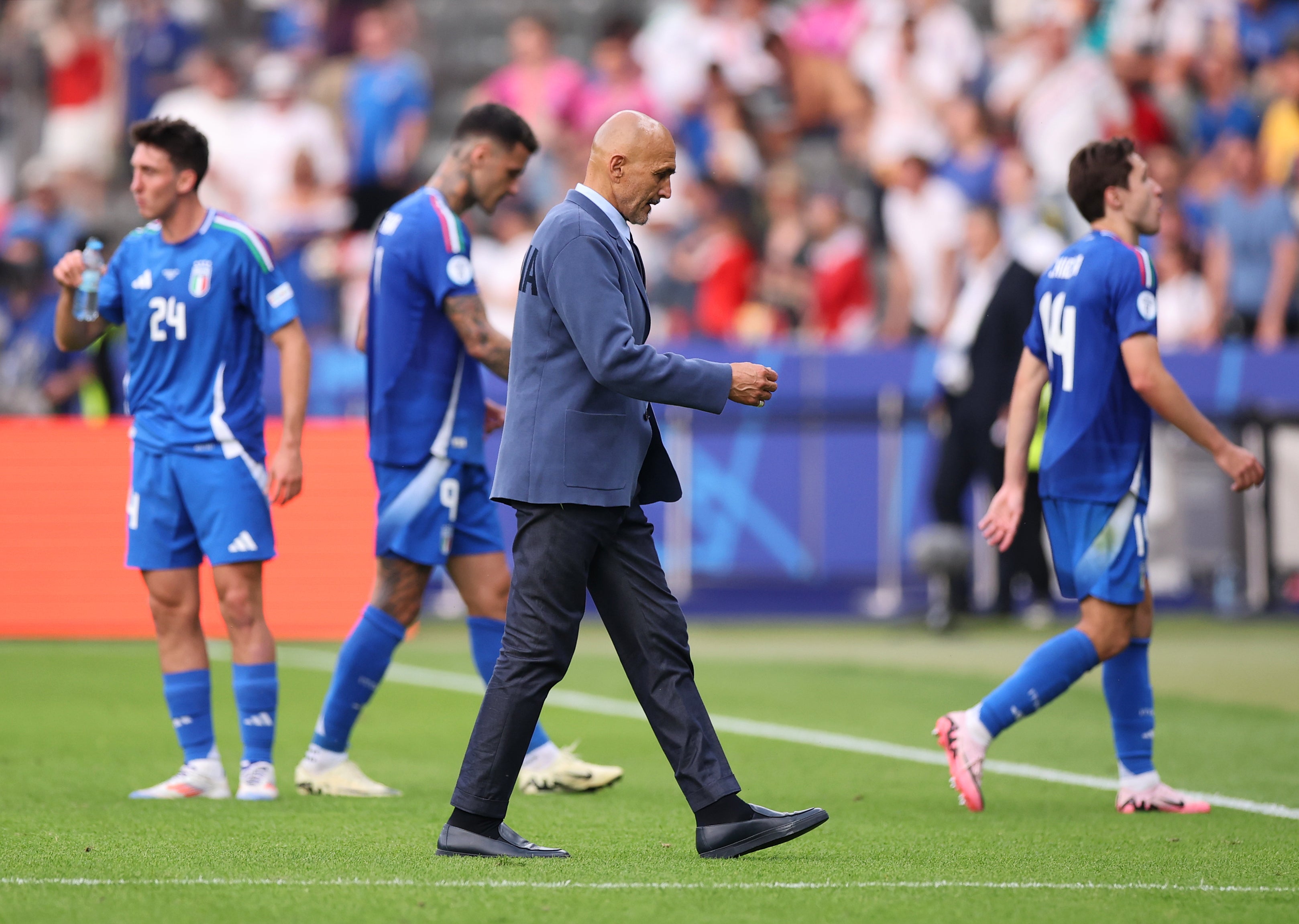 Italian head coach Luciano Spalletti walks away at full-time