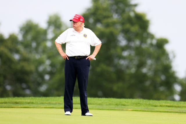 <p>Former president Donald Trump was golfing at his Florida golf club on Sunday when a gunman pointed a semi-automatic-style rifle at him </p>