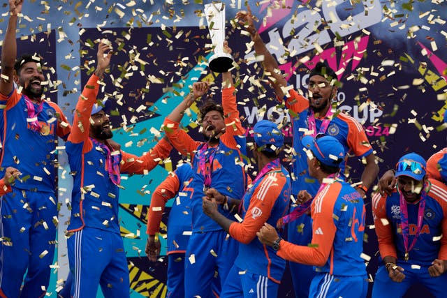 <p>India lift the T20 World Cup trophy as tickertape falls. The team has been stuck in Barbados as Hurricane Beryl makes its impacts felt </p>