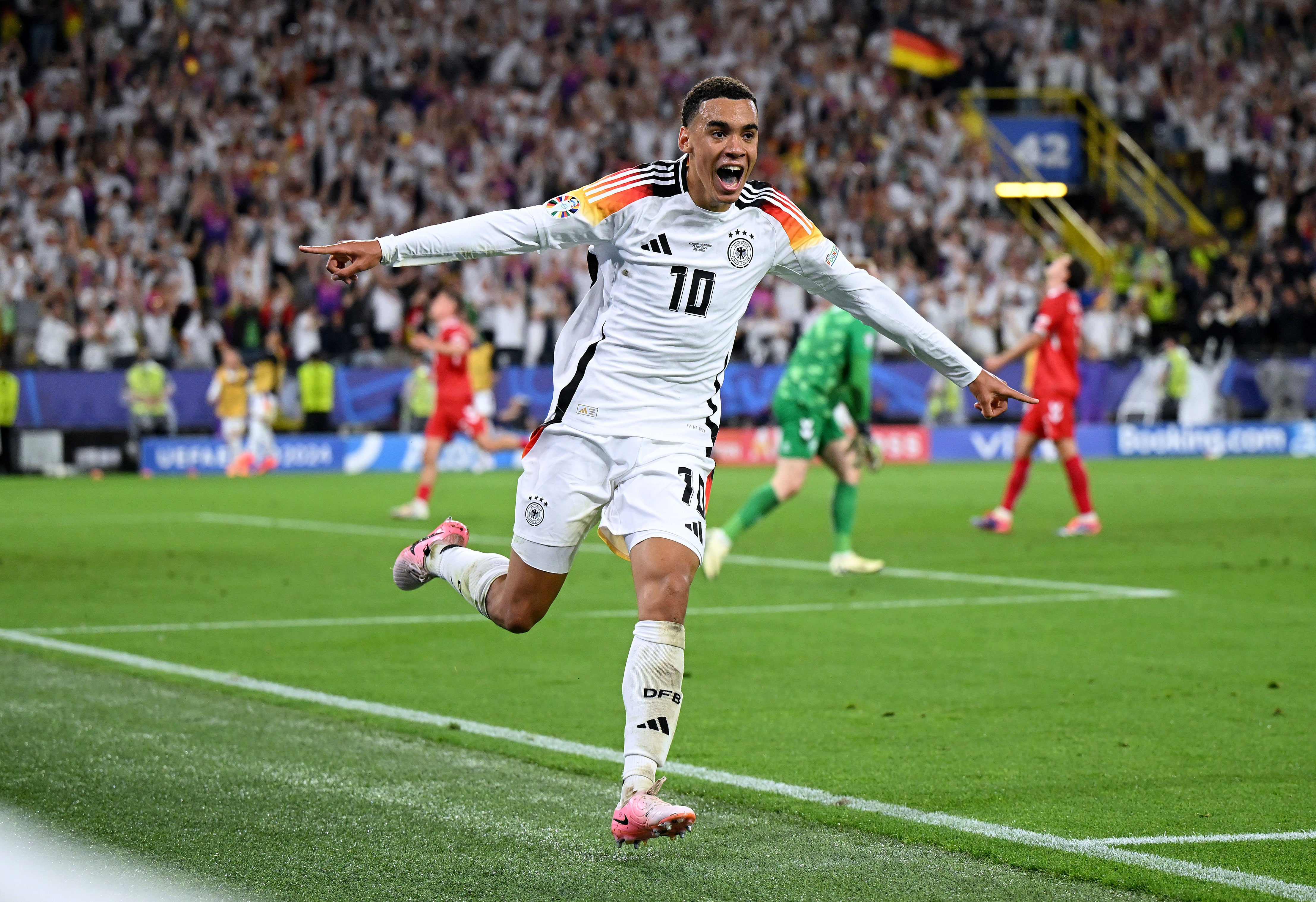 <p>Jamal Musiala celebrates after scoring Germany’s second goal</p>