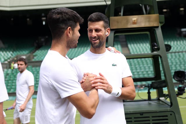 <p>Carlos Alcaraz and Novak Djokovic ahead of this year’s Wimbledon, where the Spaniard lifted the title 12 months ago </p>