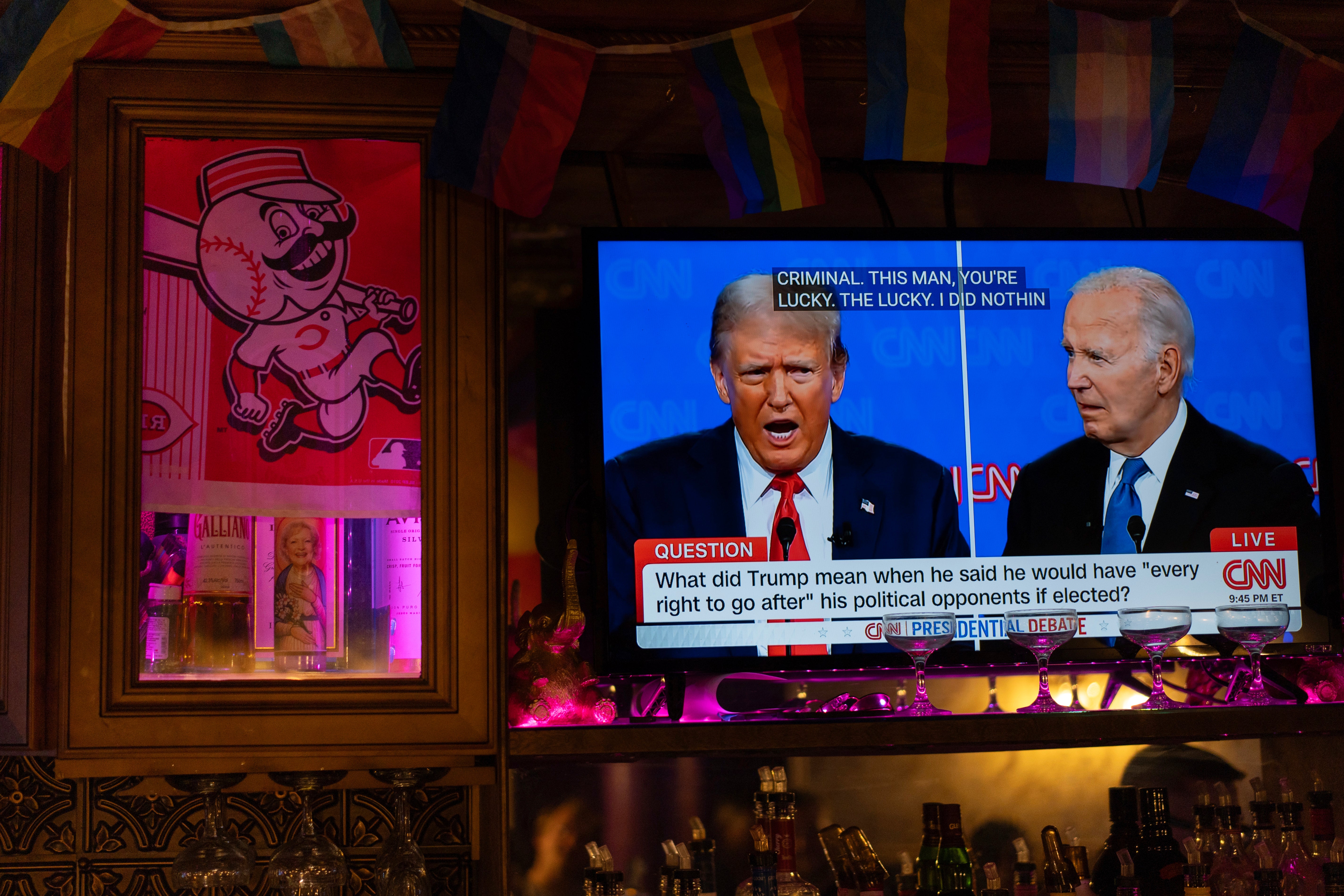 Trump and Biden on television during their presidential nominee debate last week
