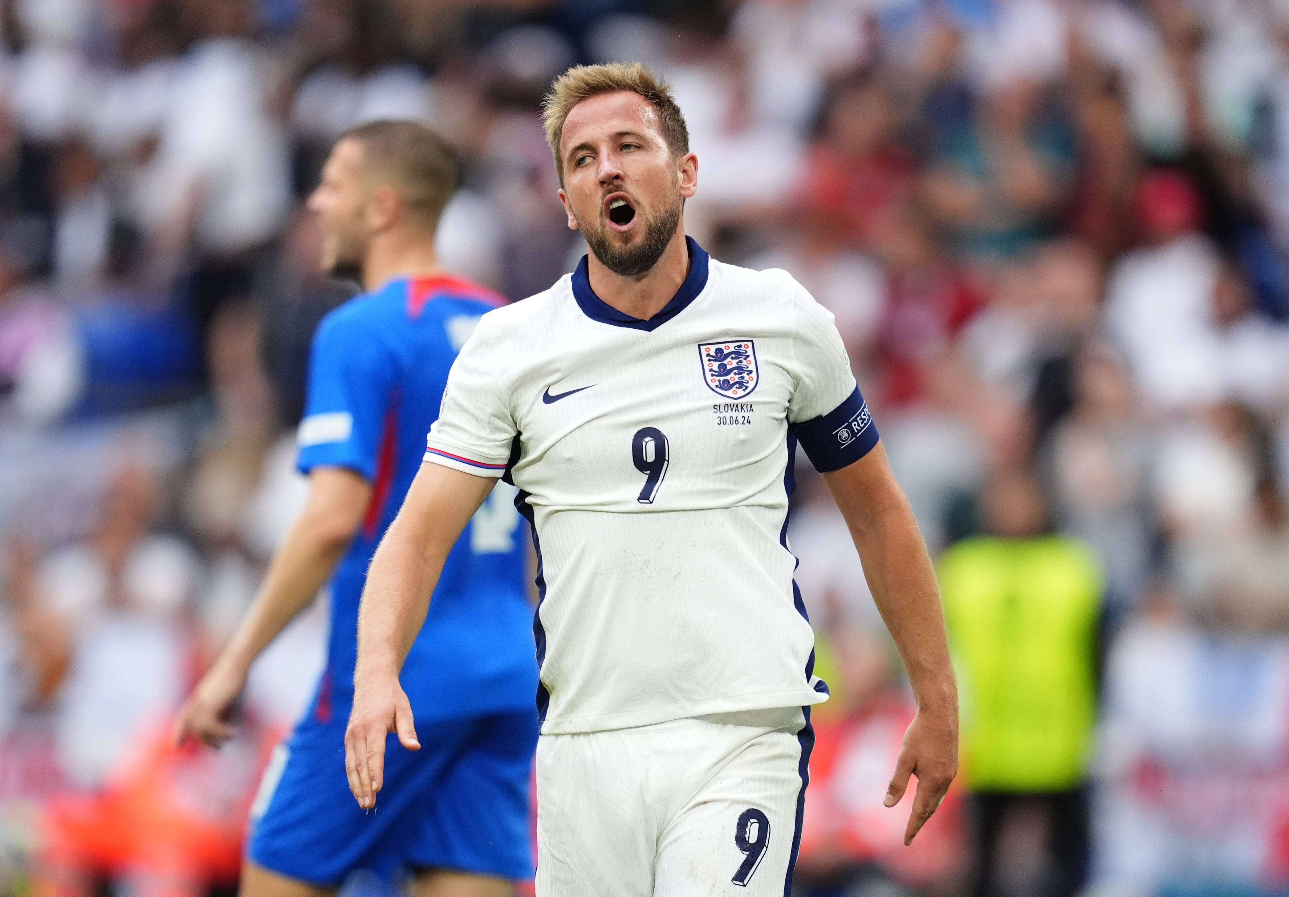 England's Harry Kane reacts after missing a chance