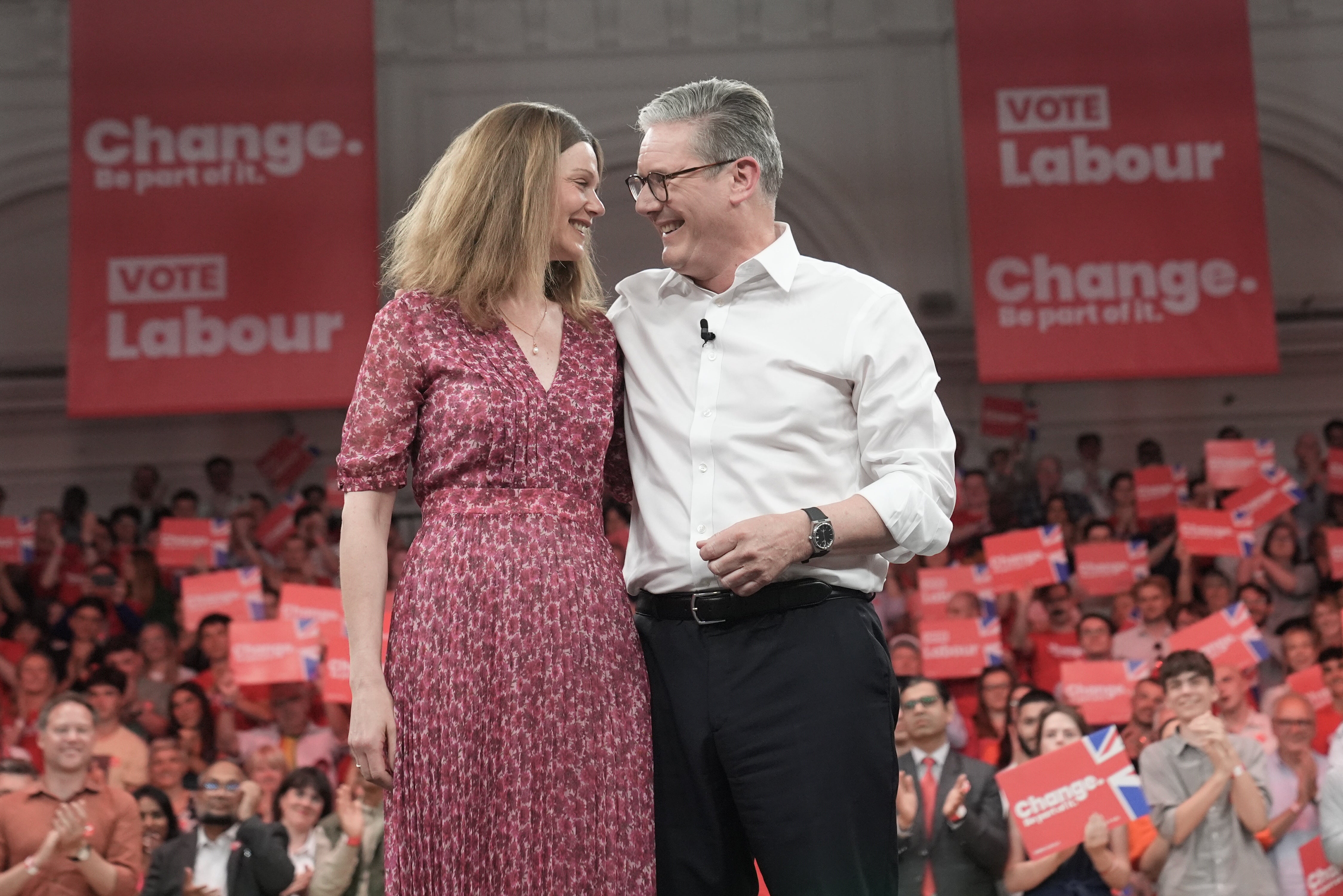Labour leader Sir Keir Starmer, with his wife Victoria, on stage after he spoke at a major campaign event at the Royal Horticultural Halls in central London (Stefan Rousseau/PA)