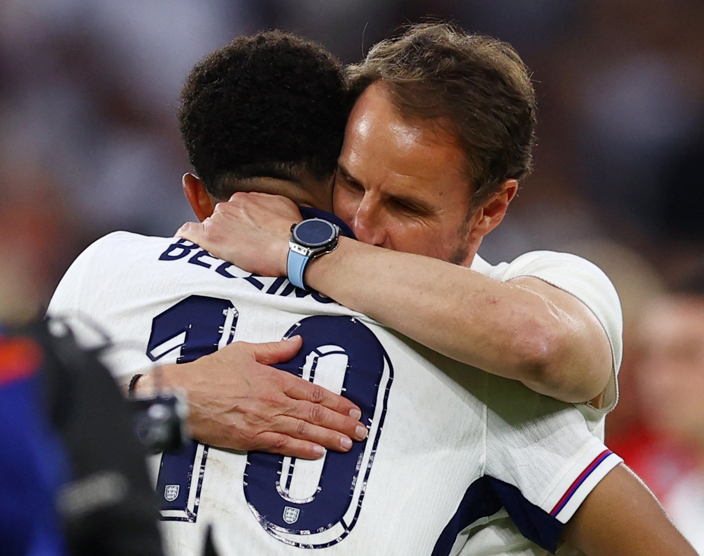 England manager Gareth Southgate celebrates with Jude Bellingham
