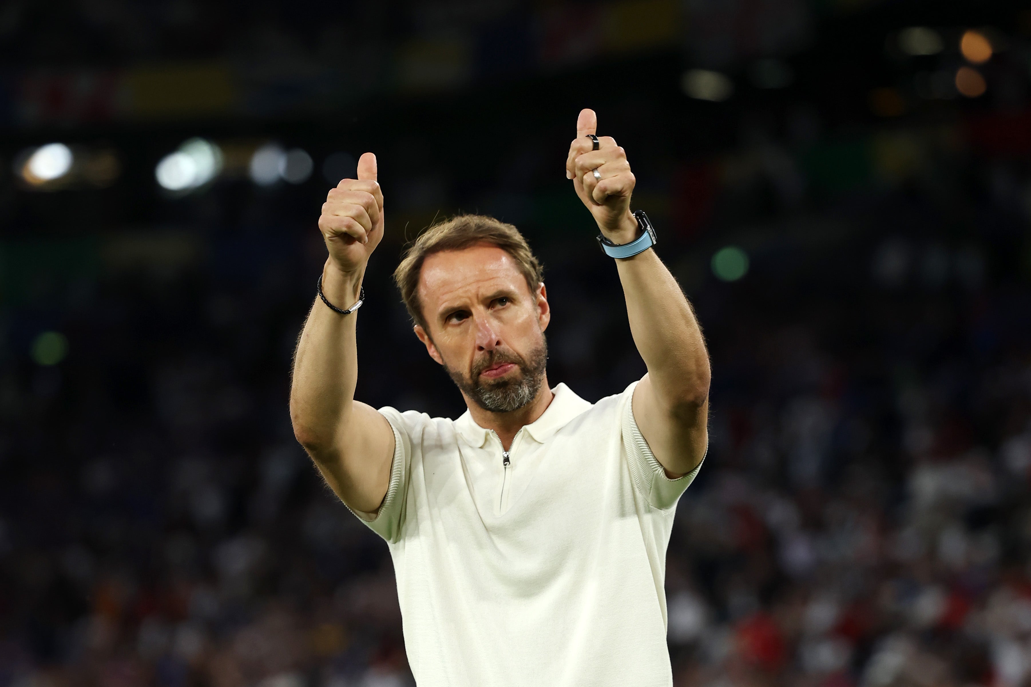 Gareth Southgaten acknowledges England fans after victory over Slovakia