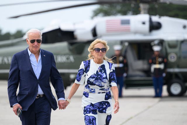 <p>Joe Biden and wife Jill Biden walk to board Air Force One at Francis S Gabreski airport in New York </p>