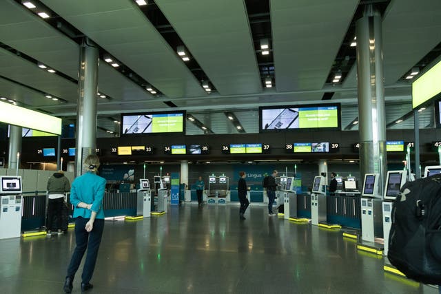 The empty Aer Lingus check-in desk area at Dublin Airport as Aer Lingus pilots begin their eight-hour strike on Saturday in a bitter dispute with the airline over pay (Evan Treacy/PA)