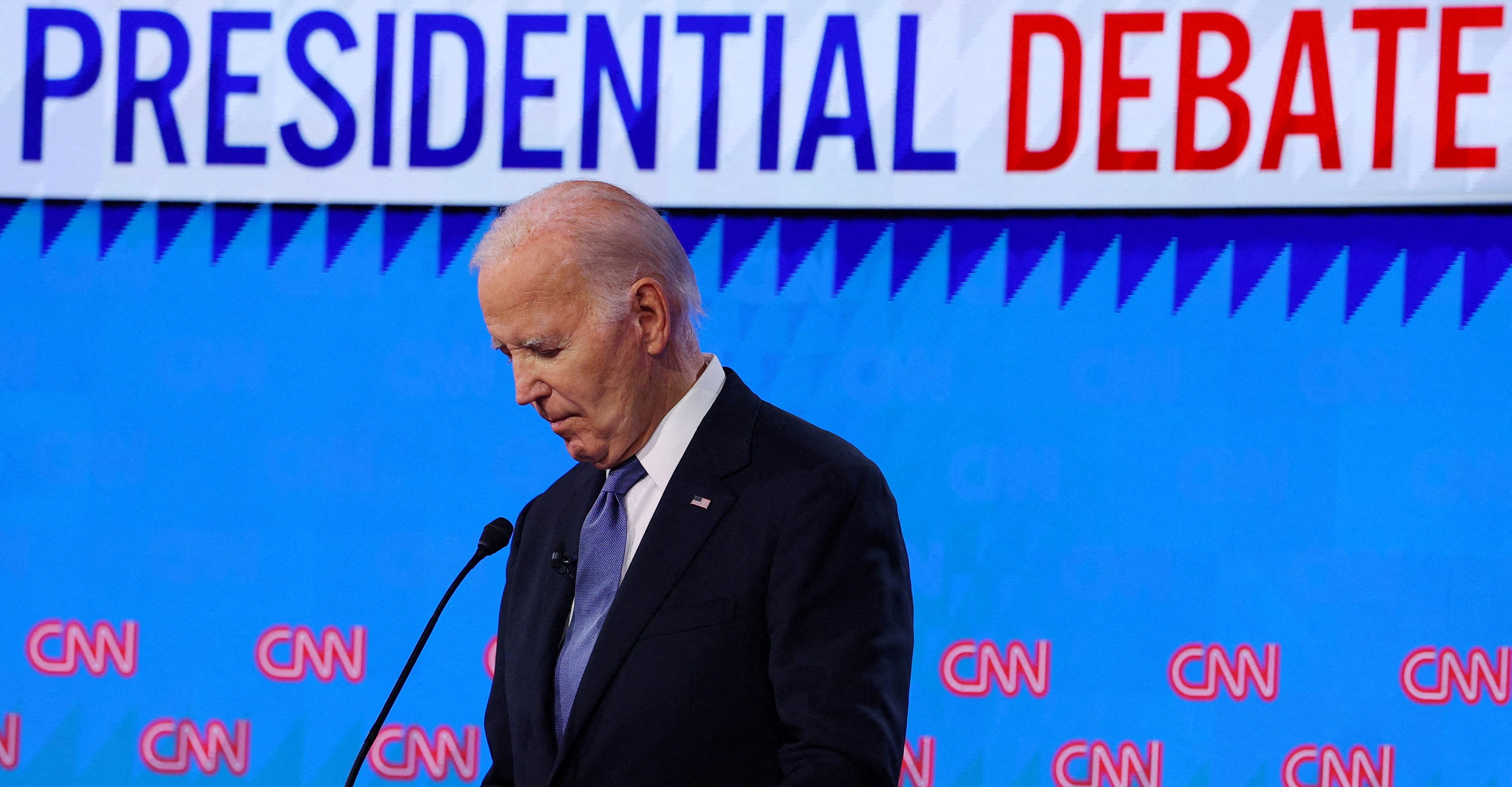 President Joe Biden listens as his opponent, Donald Trump, speaks during Thursday’s presidential debate