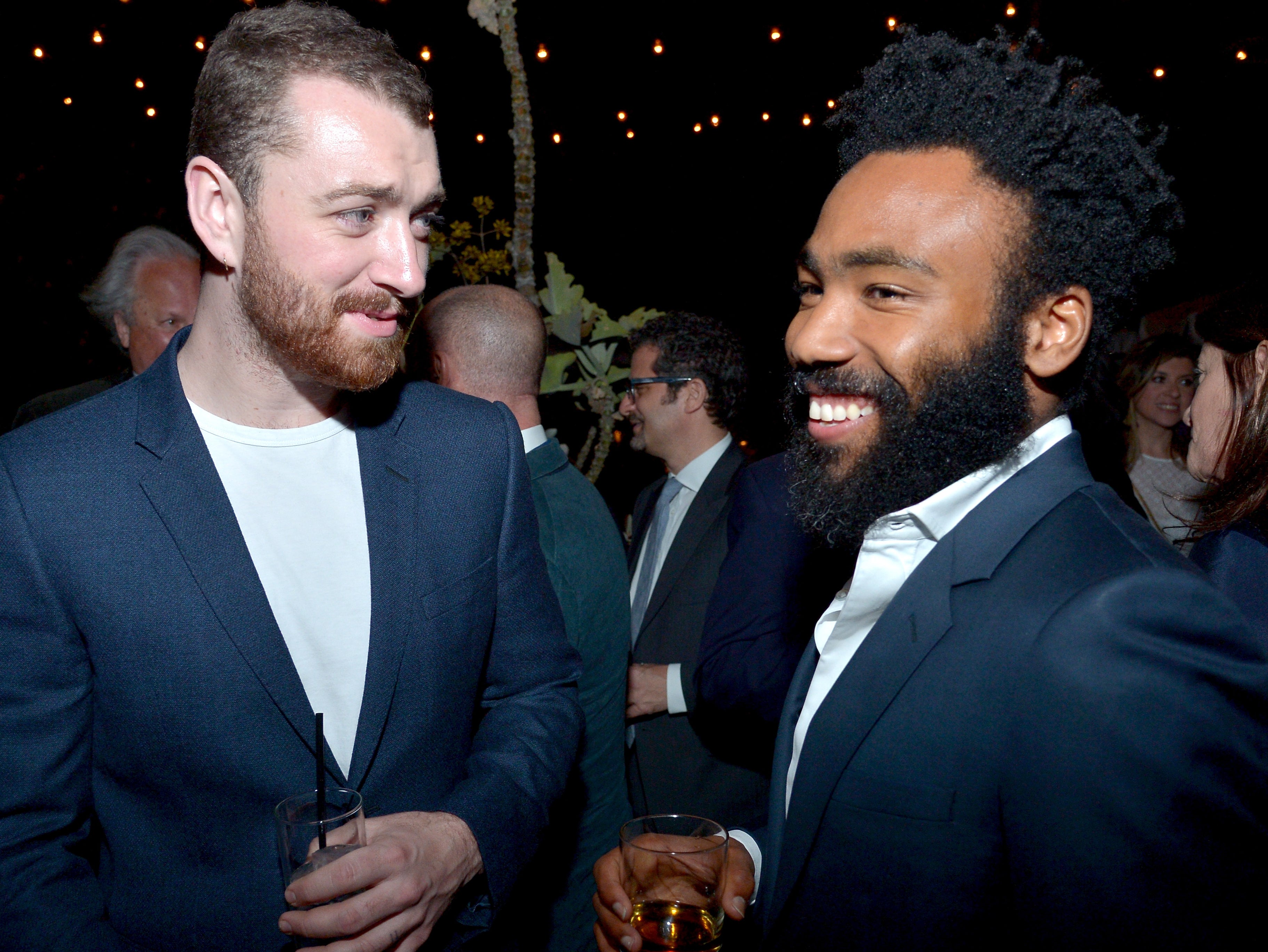 Smith and Glover at a Vanity Fair and Barneys New York dinner in 2016