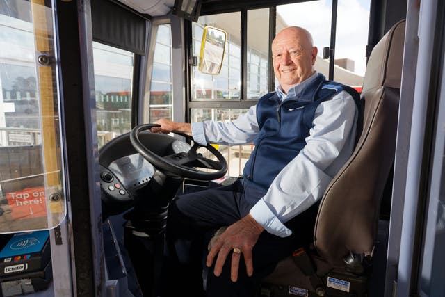 A man believed to be the UK’s longest serving bus driver has vowed to stay behind the wheel (First Bus/PA)