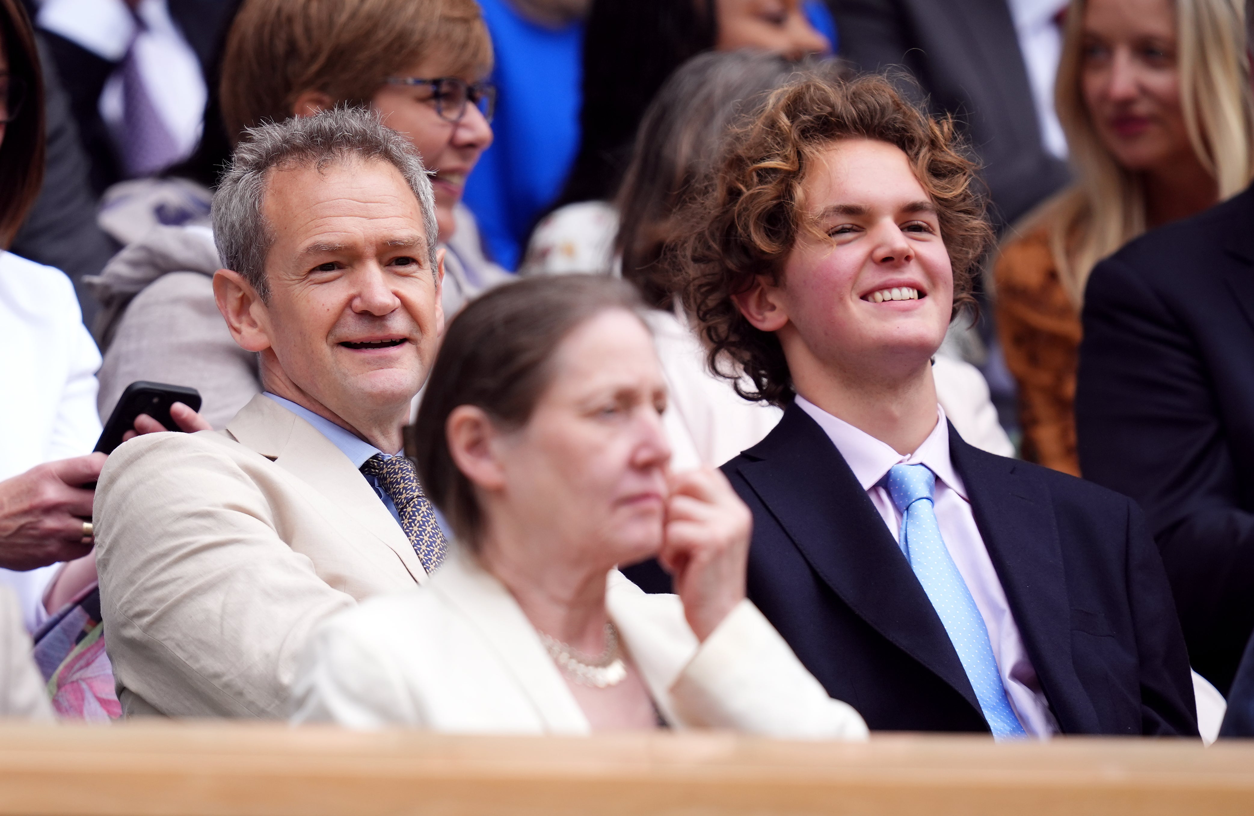 Alexander Armstrong (left) was engrossed in the tennis as Wimbledon 2024 got under way (John Walton/PA)
