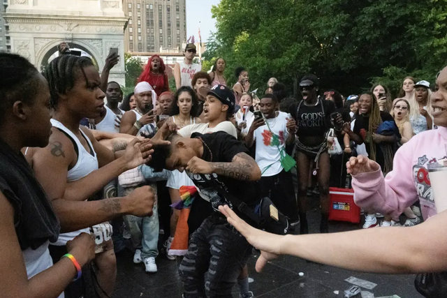 <p>Revelers fight each other during Pride in Washington Square Park in New York City on June 30, 2024</p>