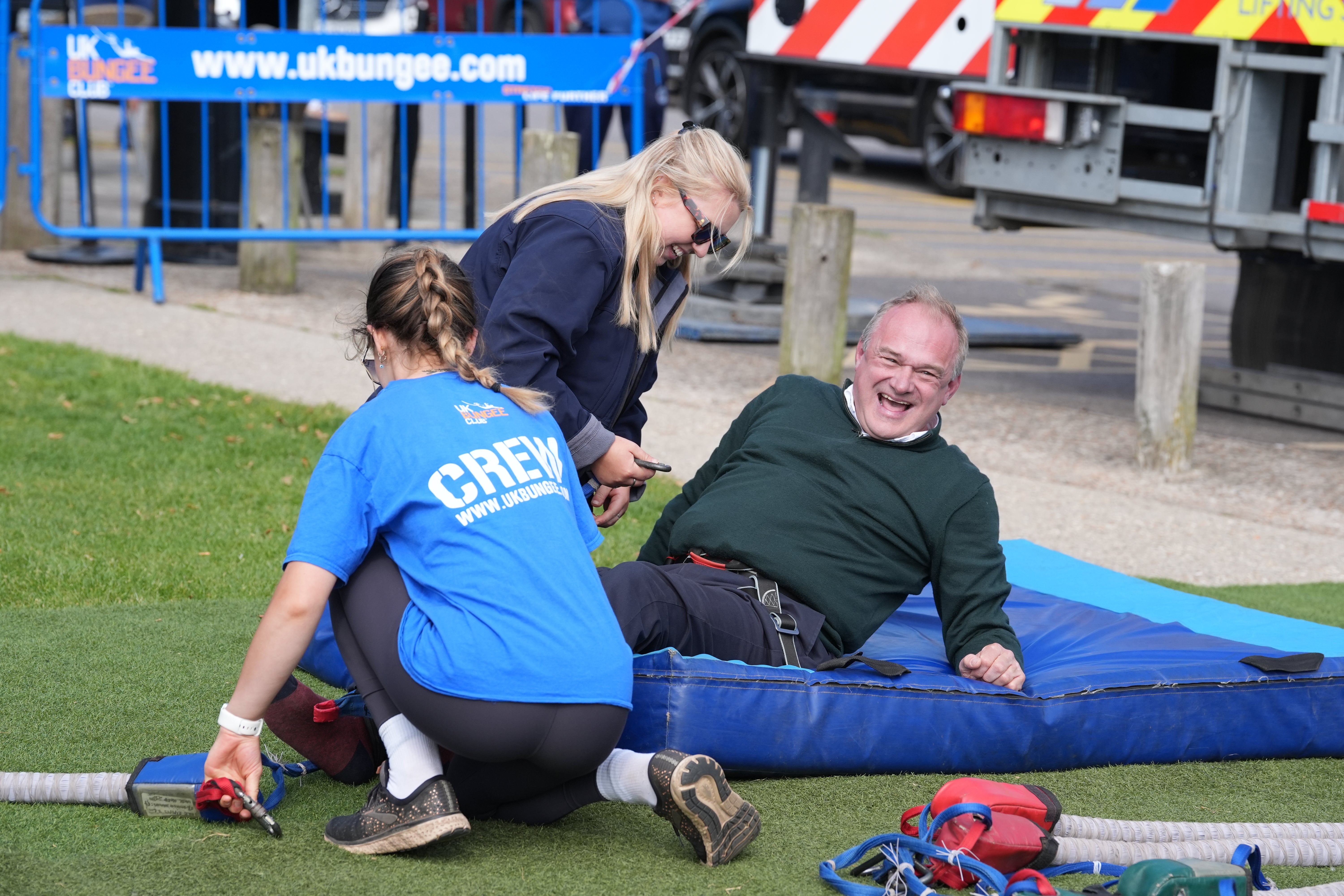 Liberal Democrat leader Sir Ed Davey after taking part in a bungee jump during a visit to Eastbourne Borough Football Club in East Sussex (Gareth Fuller/PA)