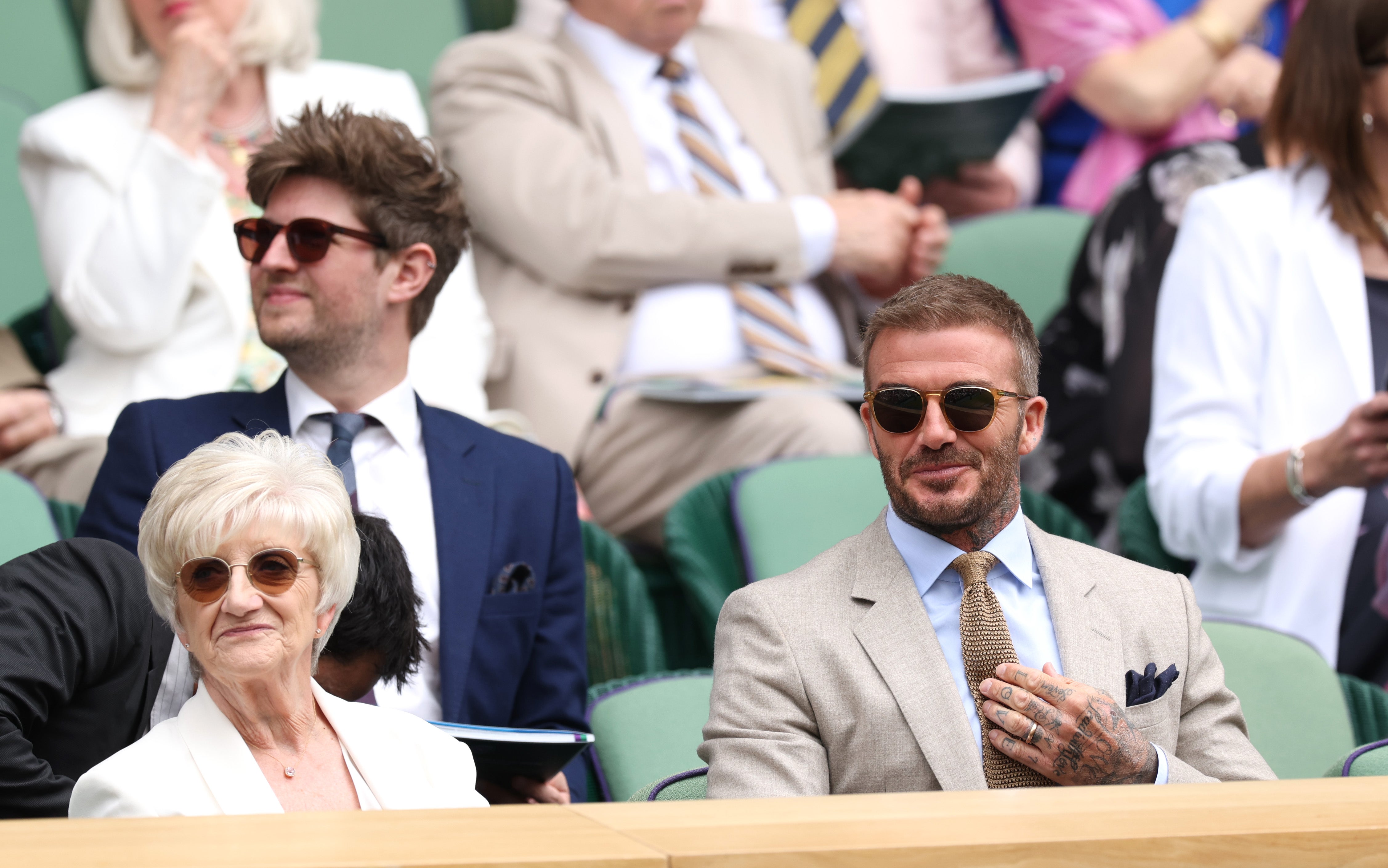 David and Sandra Beckham ahead of the Gentlemen's Singles first round match between Carlos Alcaraz of Spain and Dusan Lajovic of Serbia during day one