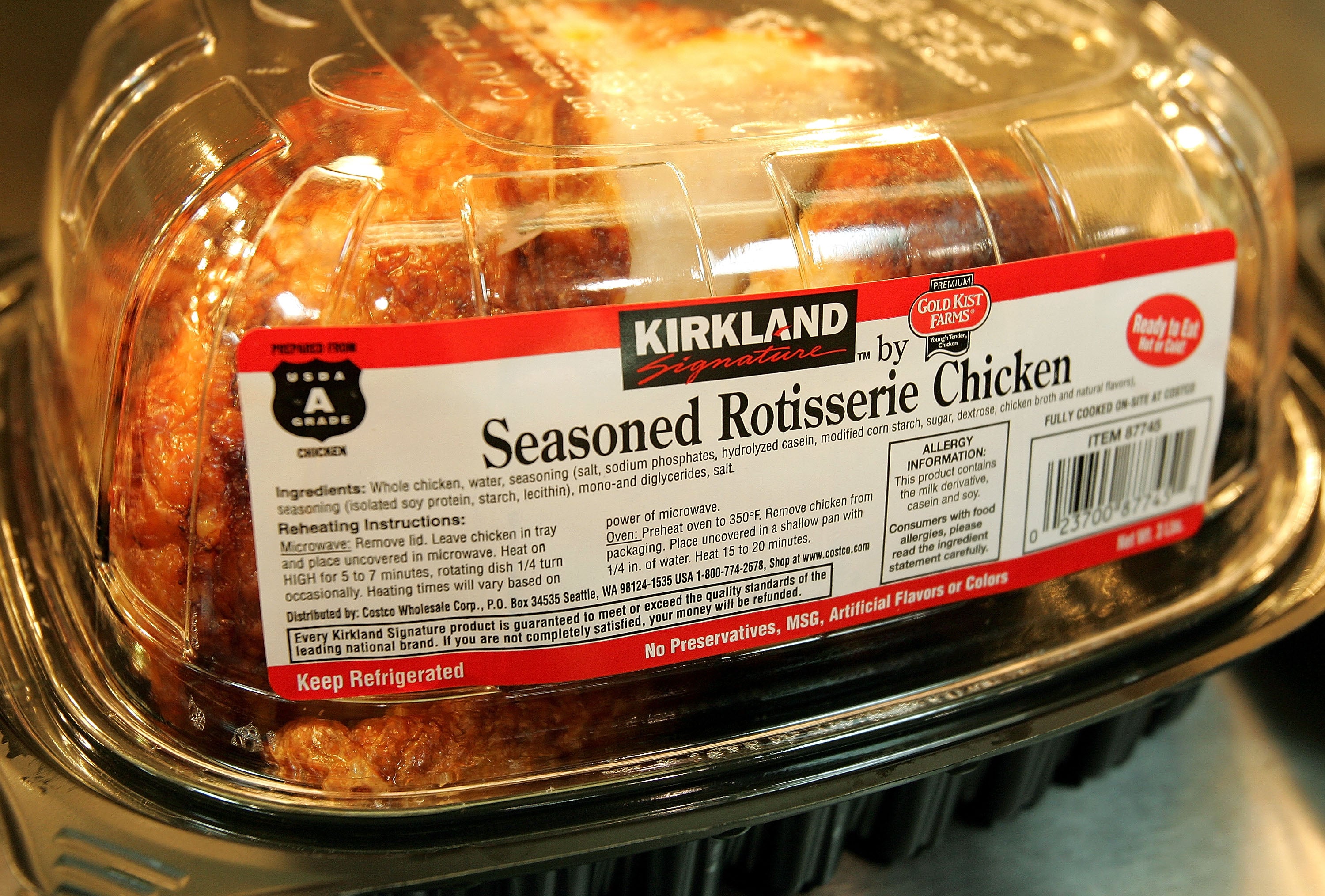 A Kirkland Signature premium brand roasted rotisserie chicken sits at a Costco store in Niles, Illinois. Changes are coming to the popular product
