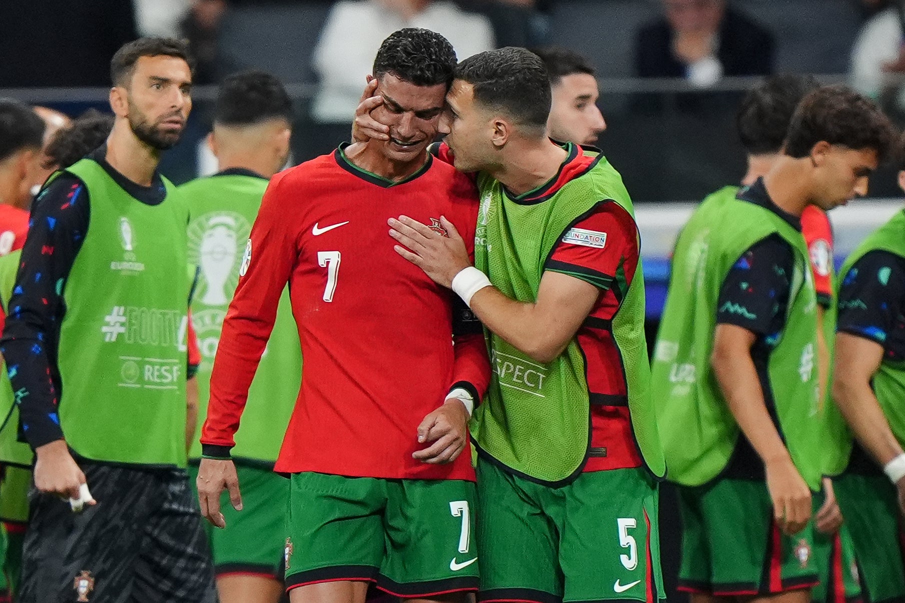 Cristiano Ronaldo is consoled by Diogo Dalot at half-time of extra-time after being denied from the penalty spot (Bradley Collyer/PA)