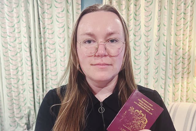 <p>Good to travel: Jessica Zielinski with the passport she was using when KLM turned her away</p>