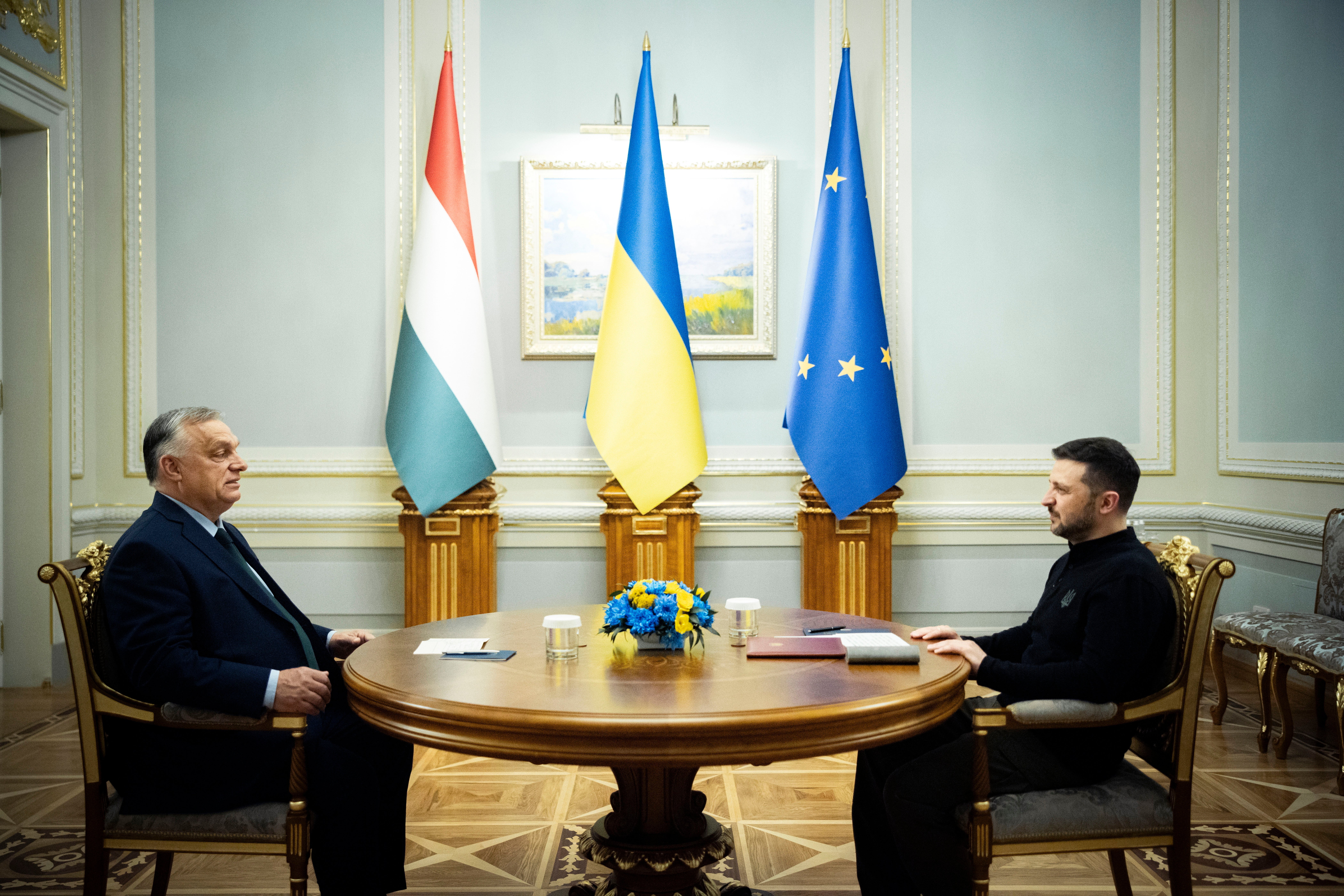 In this photo issued by the Hungarian PM's Press Office Ukrainian President Volodymyr Zelenskyy, right, and Hungarian Prime Minister Viktor Orban hold a meeting in Kyiv, Ukraine