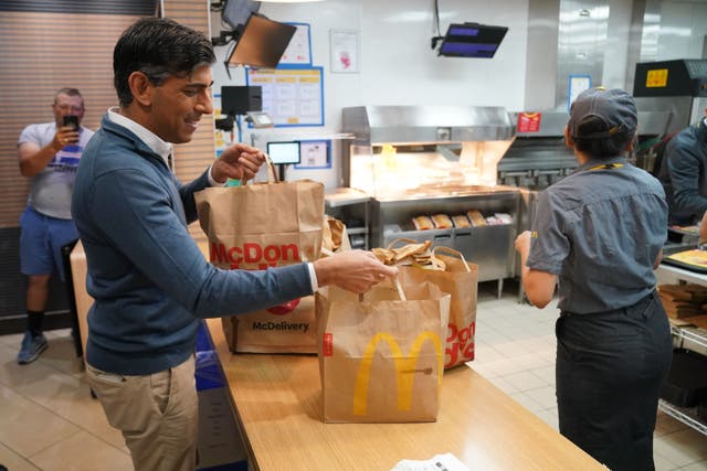 Prime Minister Rishi Sunak bought breakfast for those on the Tory battle bus at Beaconsfield Services in Buckinghamshire ( Jonathan Brady/PA)