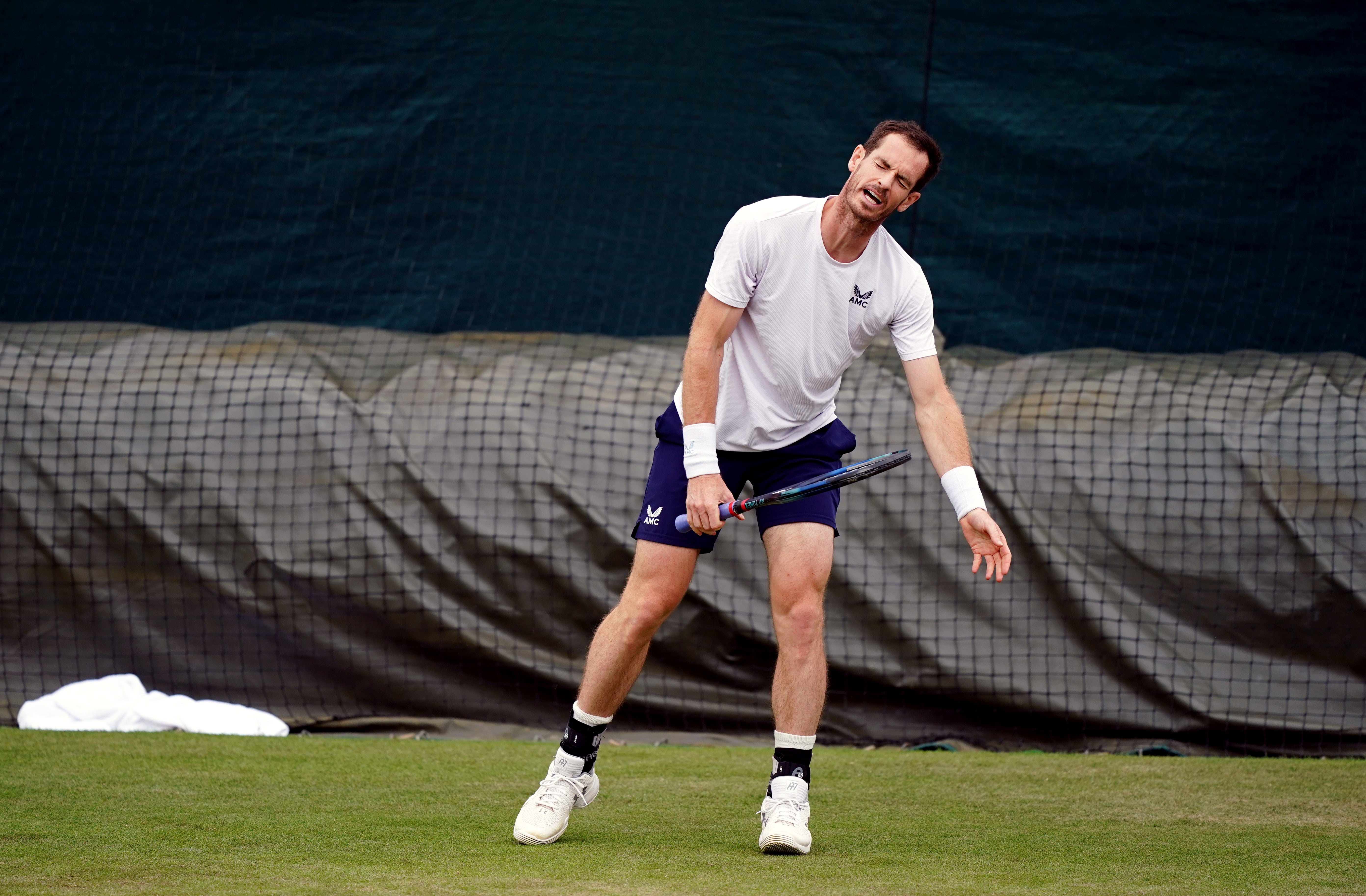Two-time Wimbledon champion Andy Murray pulled out of the singles at the tournament at the last minute on Tuesday after struggling to recover from back surgery (Jordan Pettitt/PA)