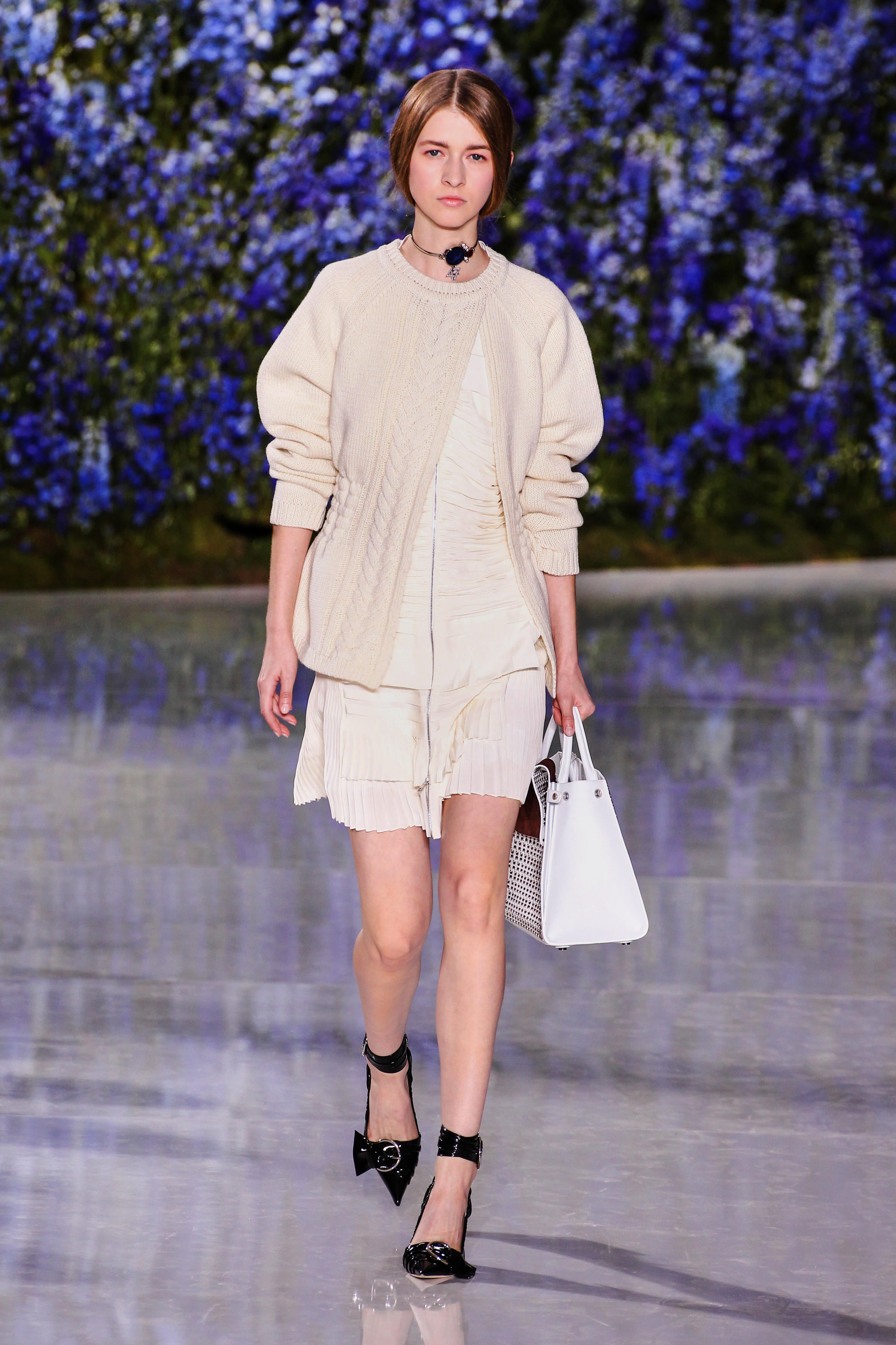 Chunky knitwear with silk frocks have reigned supreme on Dior’s s/s runways (Alamy/PA)