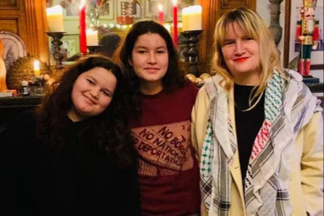 <p>Emma Watt with her two daughters Ameenah, 11, and Malika, 14</p>