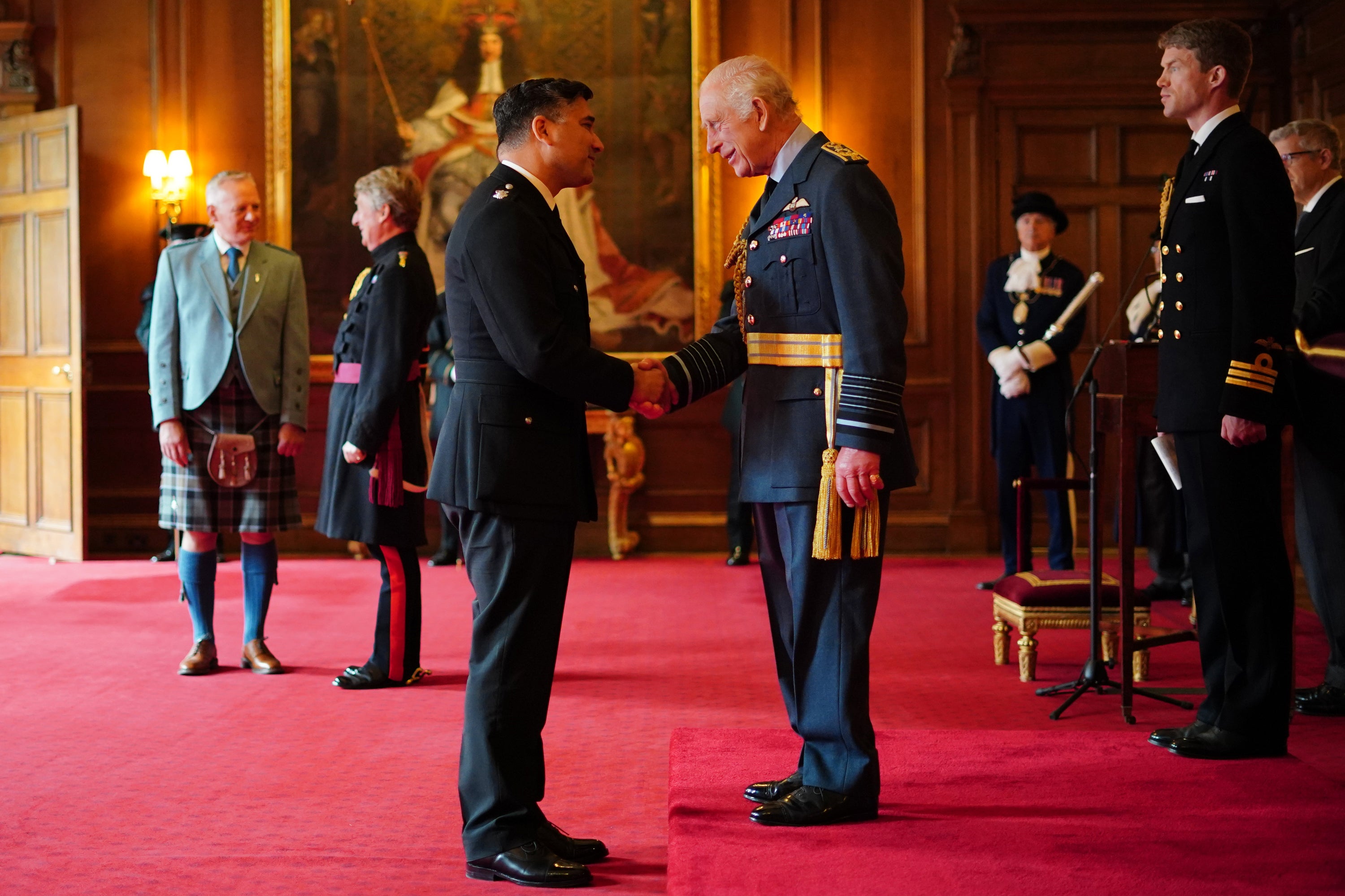 Chief Superintendent Faroque Hussain was decorated with the King’s Police Medal during the ceremony (Jane Barlow/PA)
