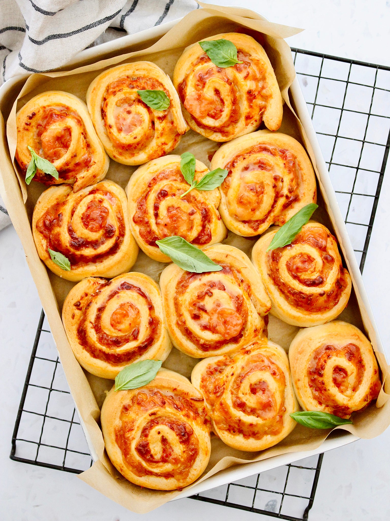 These easy peasy pizza scrolls are a sure fire crowd pleaser, whether as a snack or part or as a meal