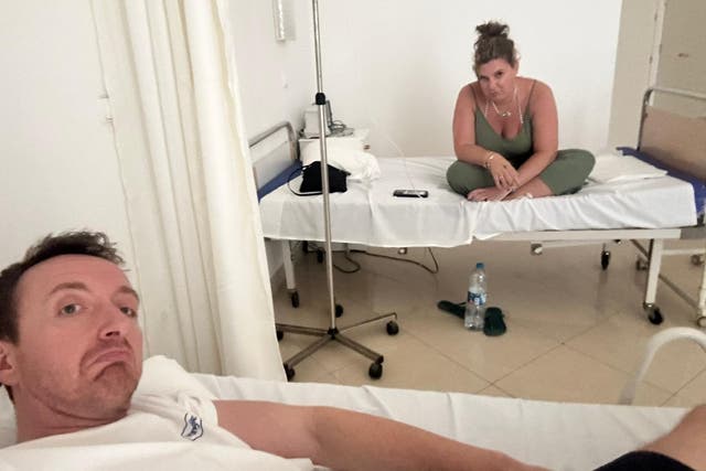 <p>Lorraine Wilson and Mark Bonner in the hospital after experiencing gastric illness whilst staying at the Riu Palace Santa Maria hotel in Cape Verde</p>