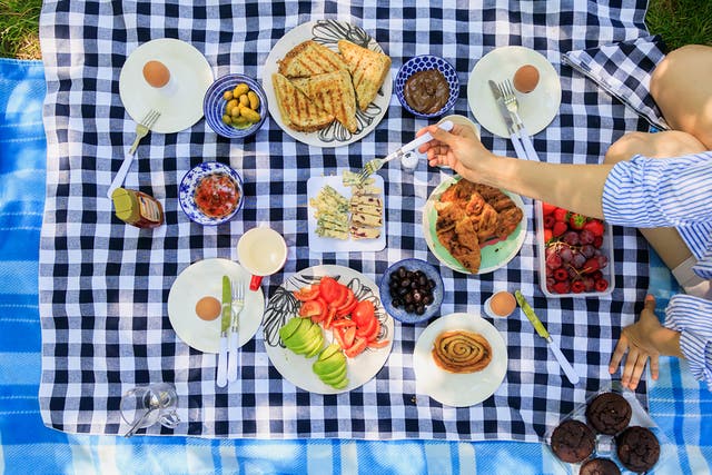 <p>A spread to impress: there’s no better time to pack a picnic and enjoy the great outdoors</p>