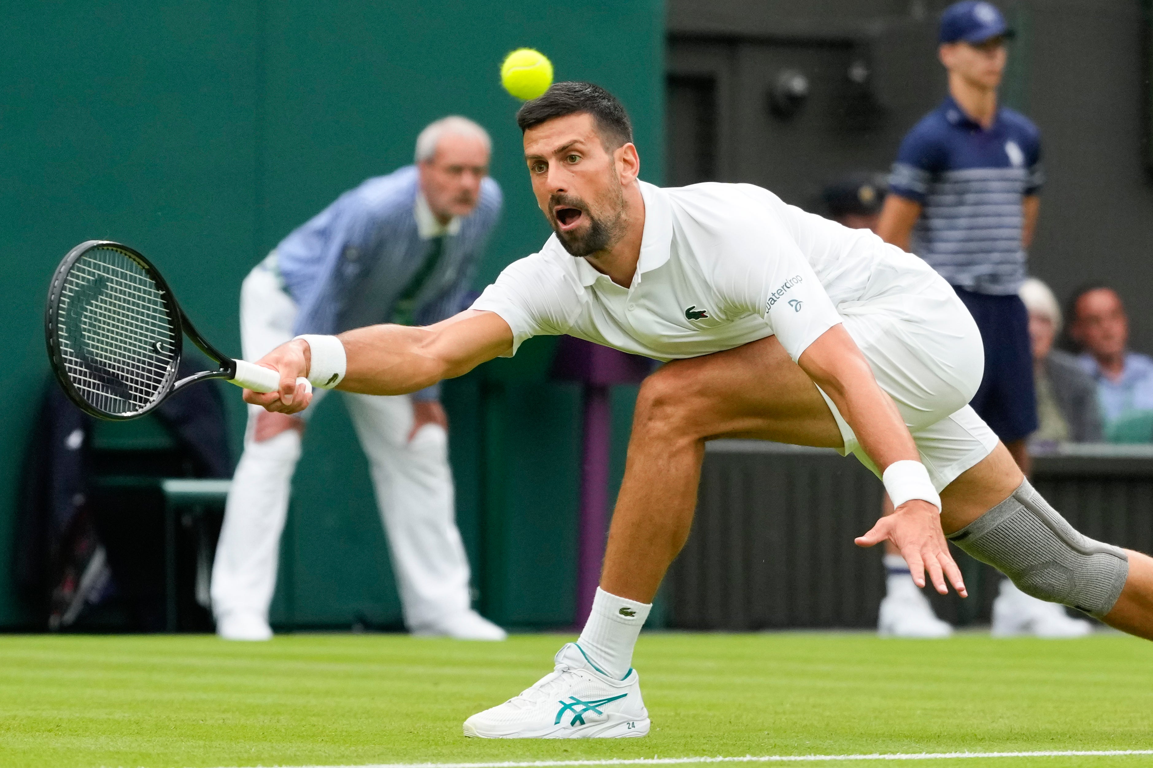 Djokovic showed no ill-effects from his stretches and slides