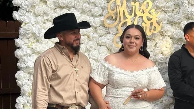 <p>Dulce and Manuel Gonzalez at their wedding on Friday moments before gunmen stormed the event and shot the groom in the head</p>