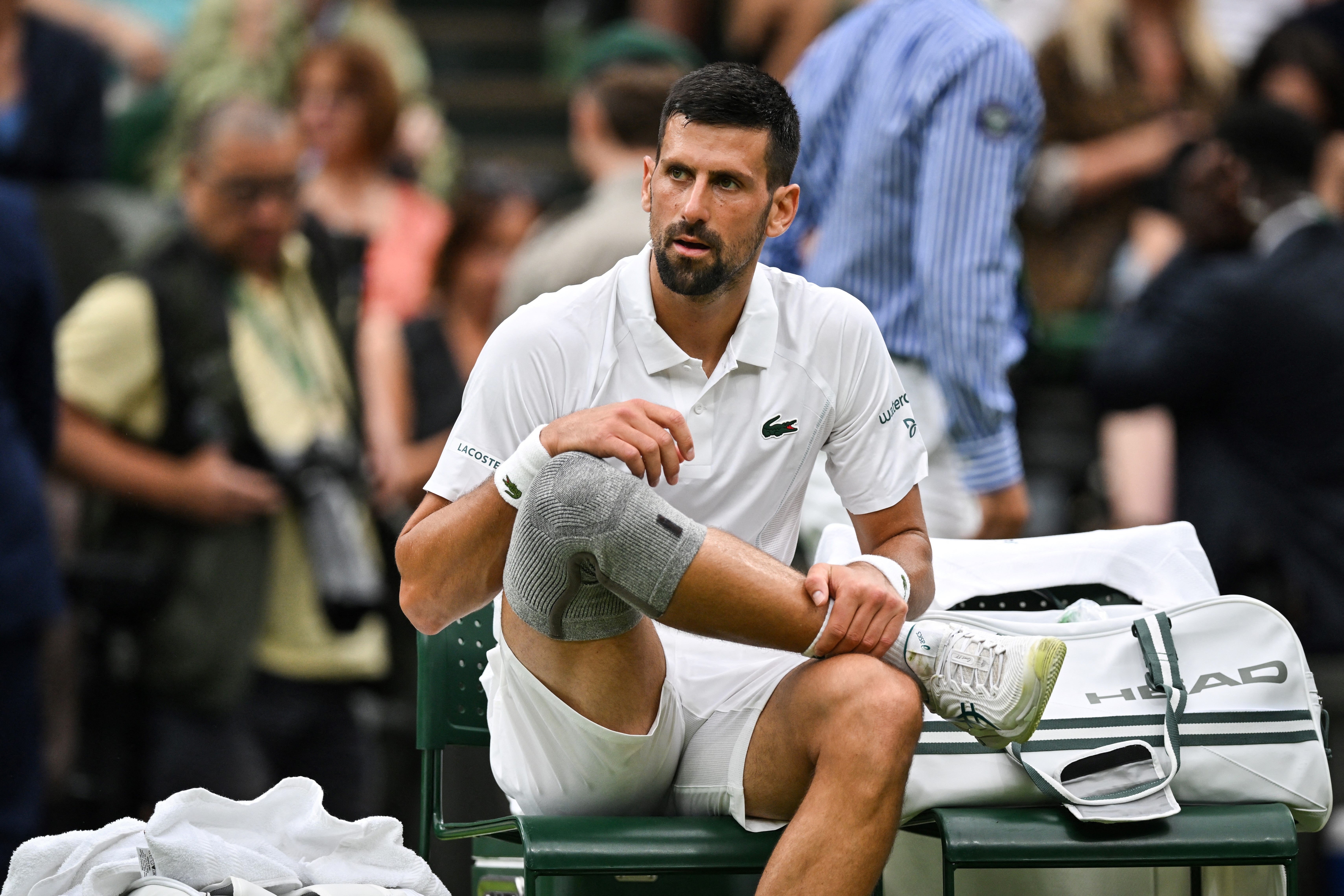 Novak Djokovic was sporting a grey compression sleeve on his right knee