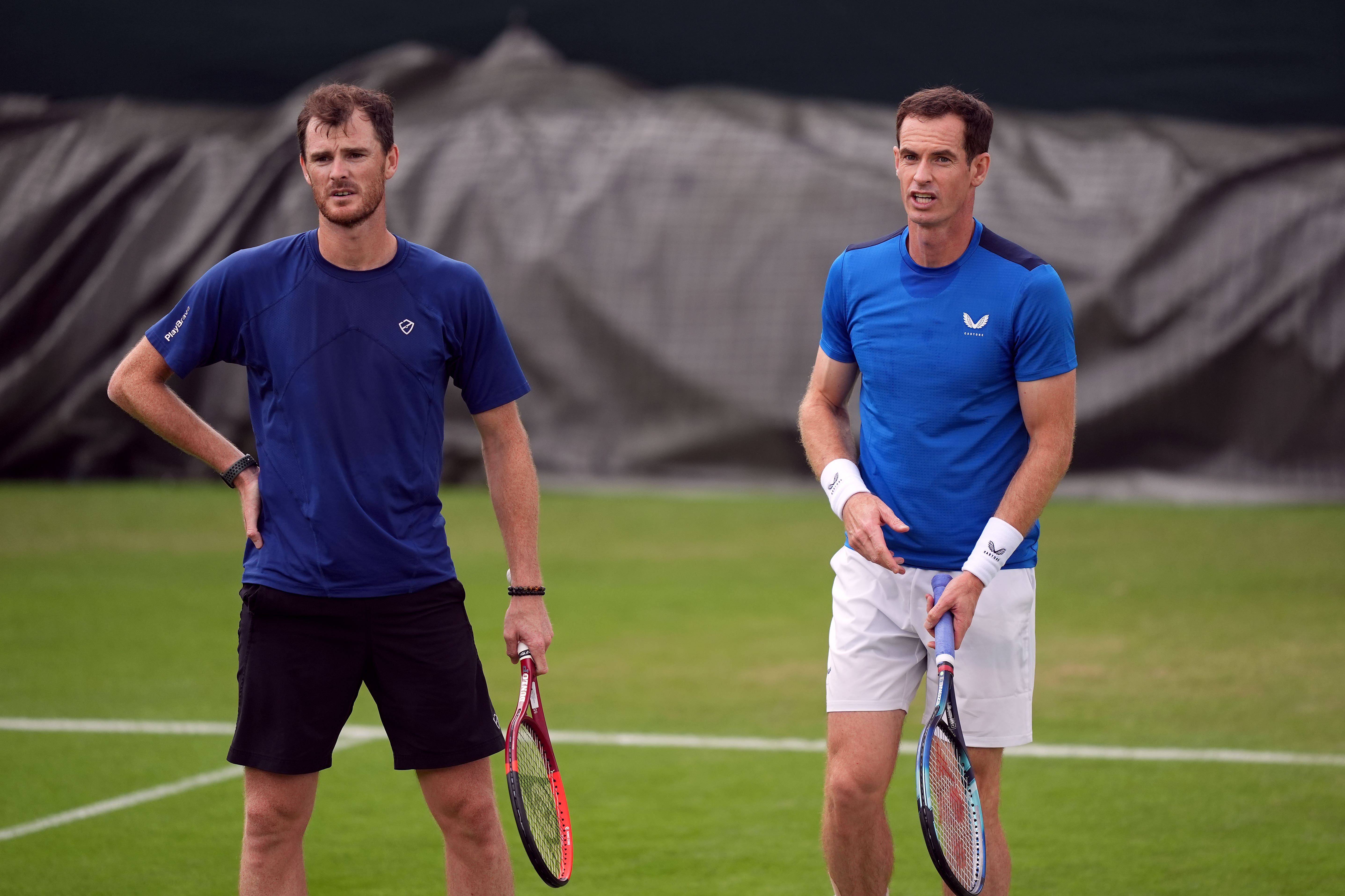 Andy Murray and Jamie Murray on the practice courts (Jordan Pettitt/PA)